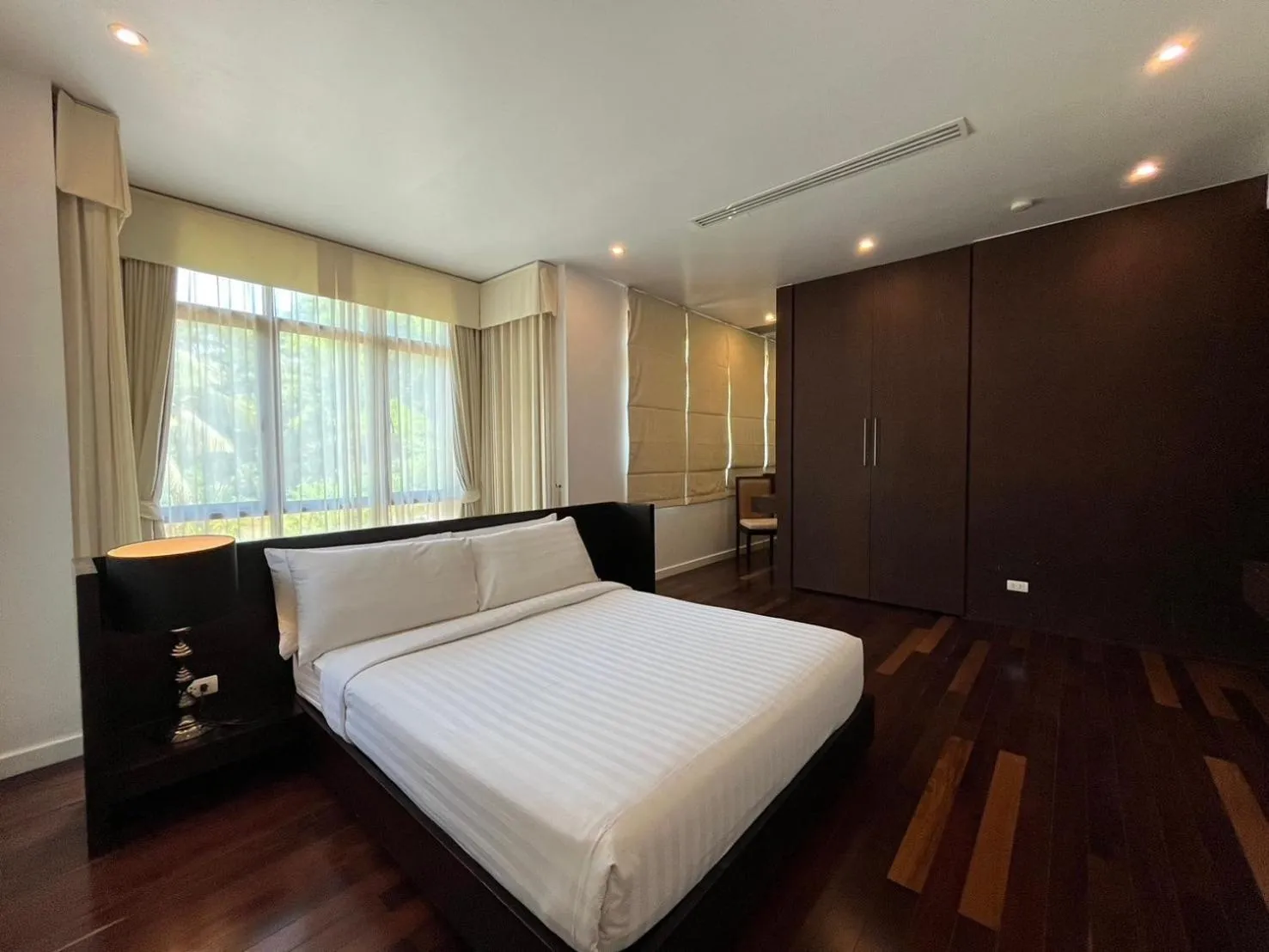 Bedroom, Bed in Amatapura Beachfront Villa 1, SHA Certified