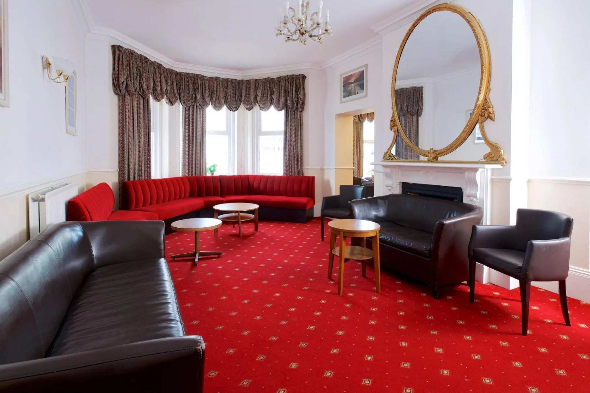 Communal lounge/ TV room in The Bournemouth Maemar Hotel