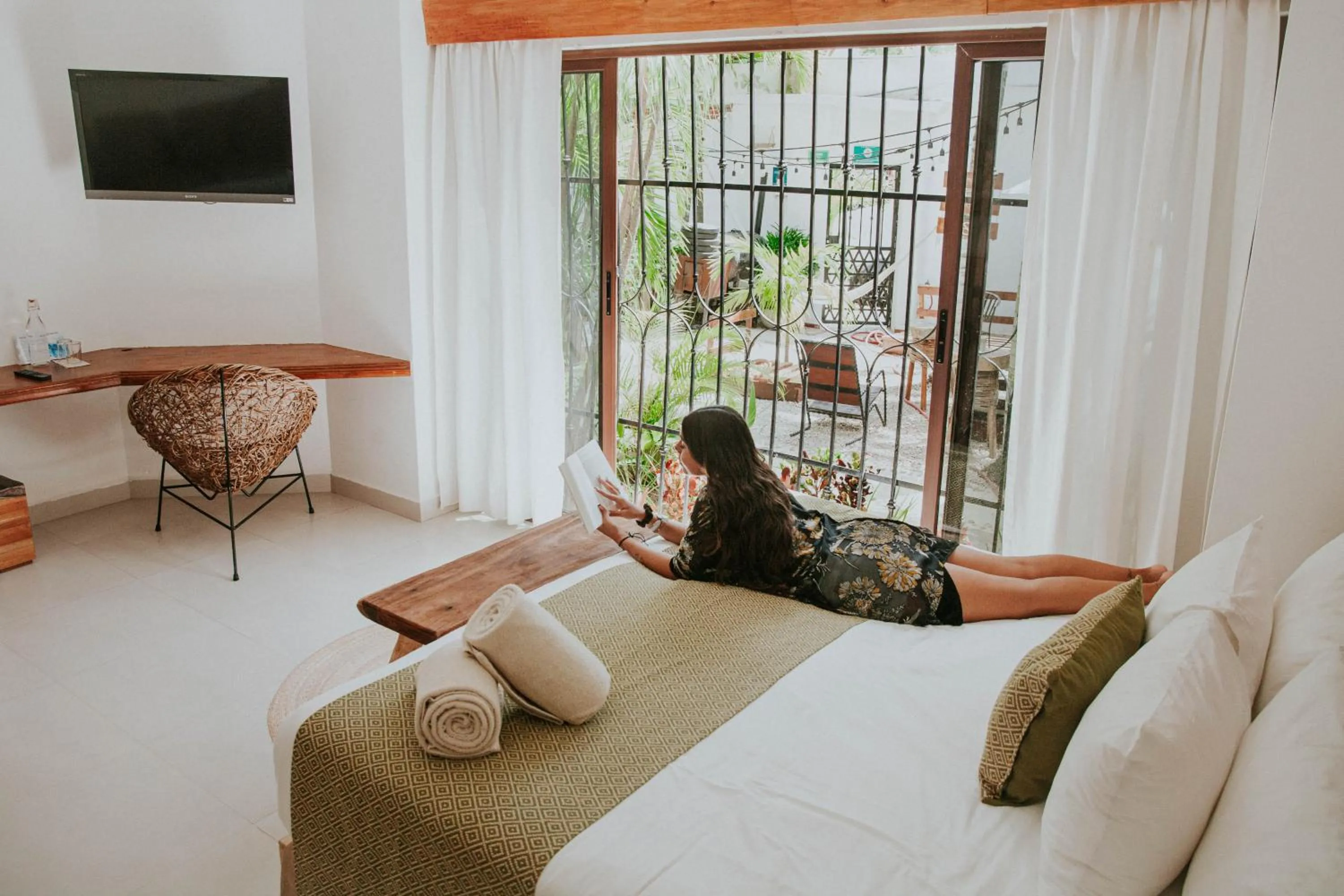 Bed in Enigmatic Hotel Experience