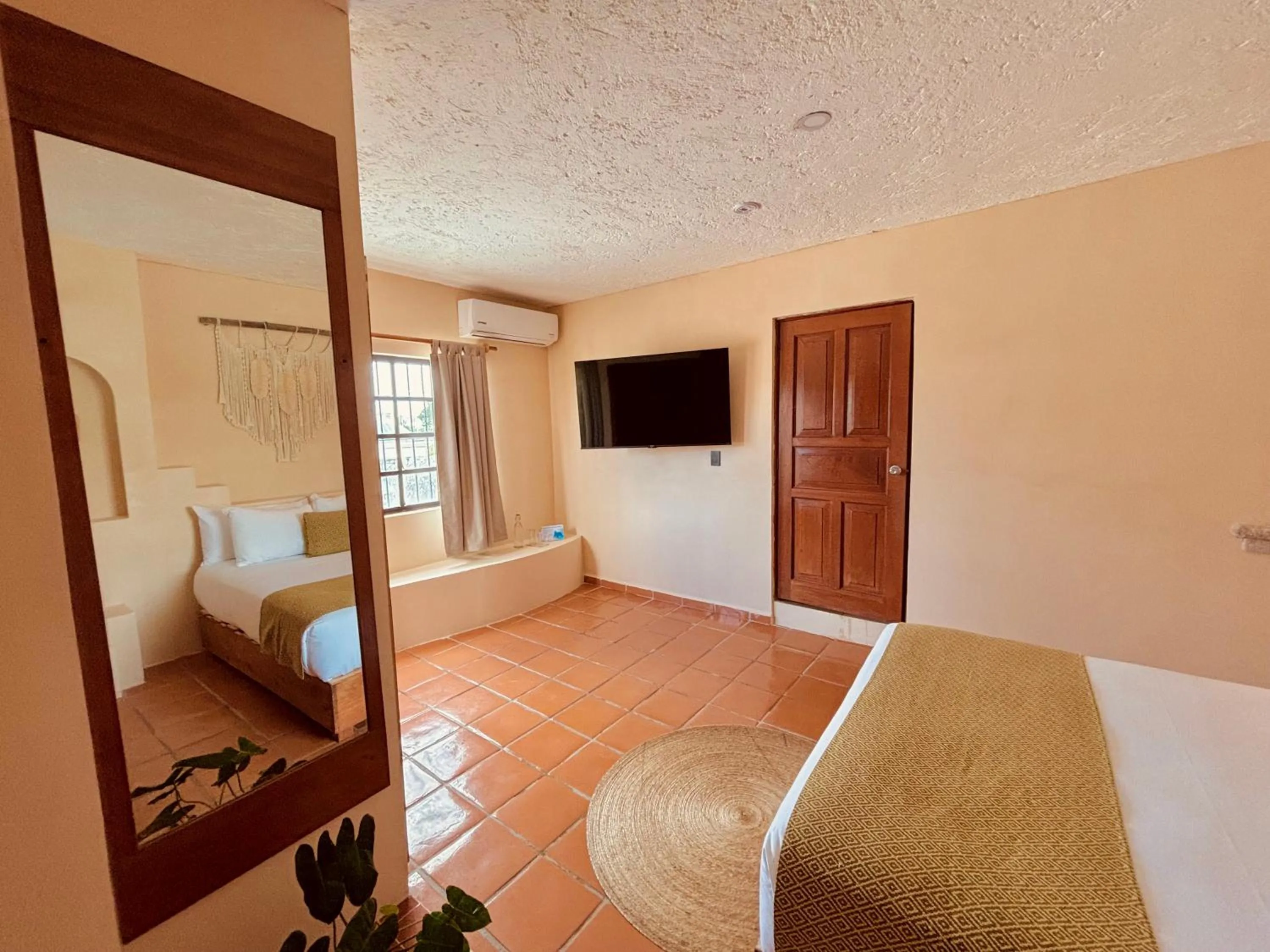 Bed in Enigmatic Hotel Experience