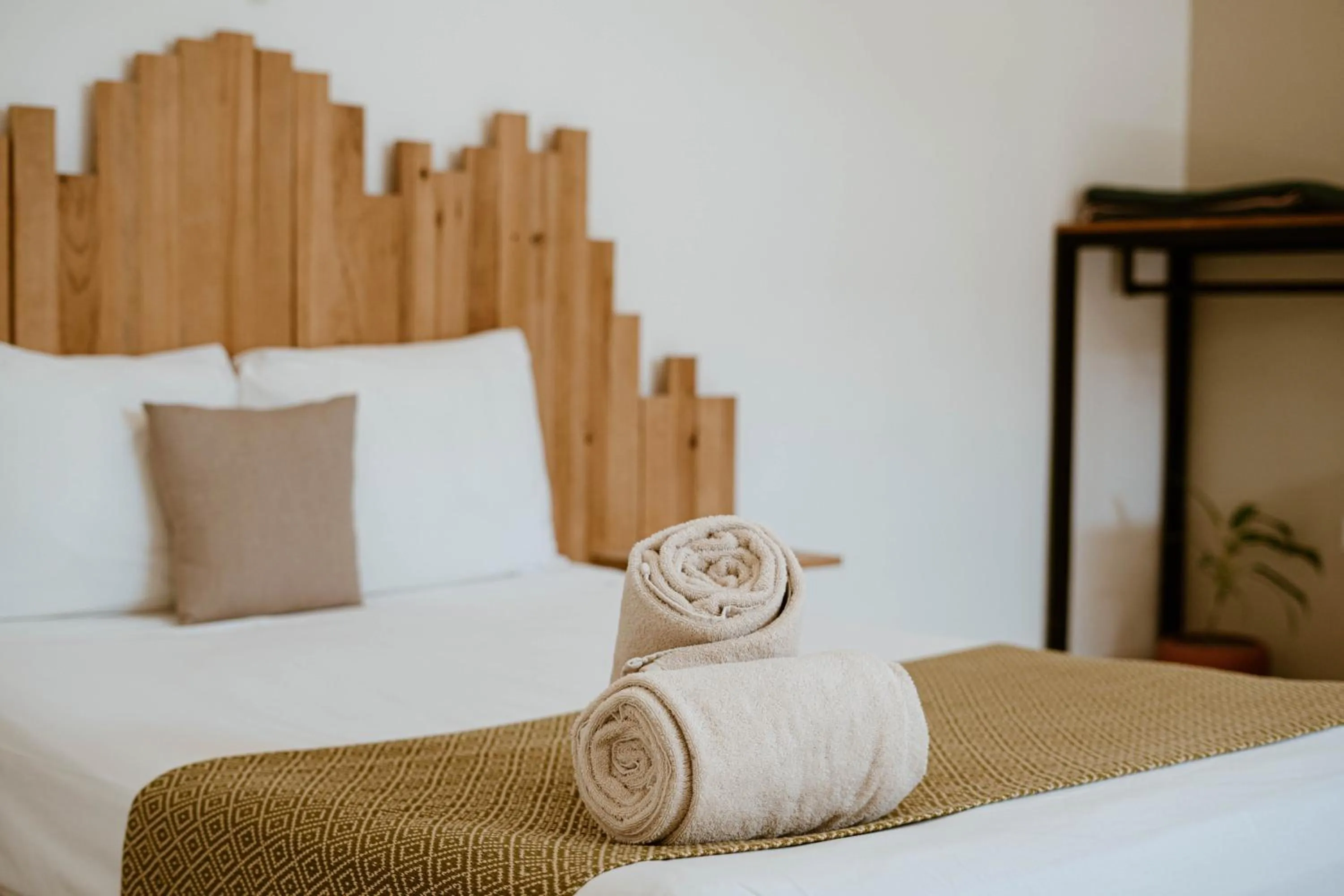 Bed in Enigmatic Hotel Experience