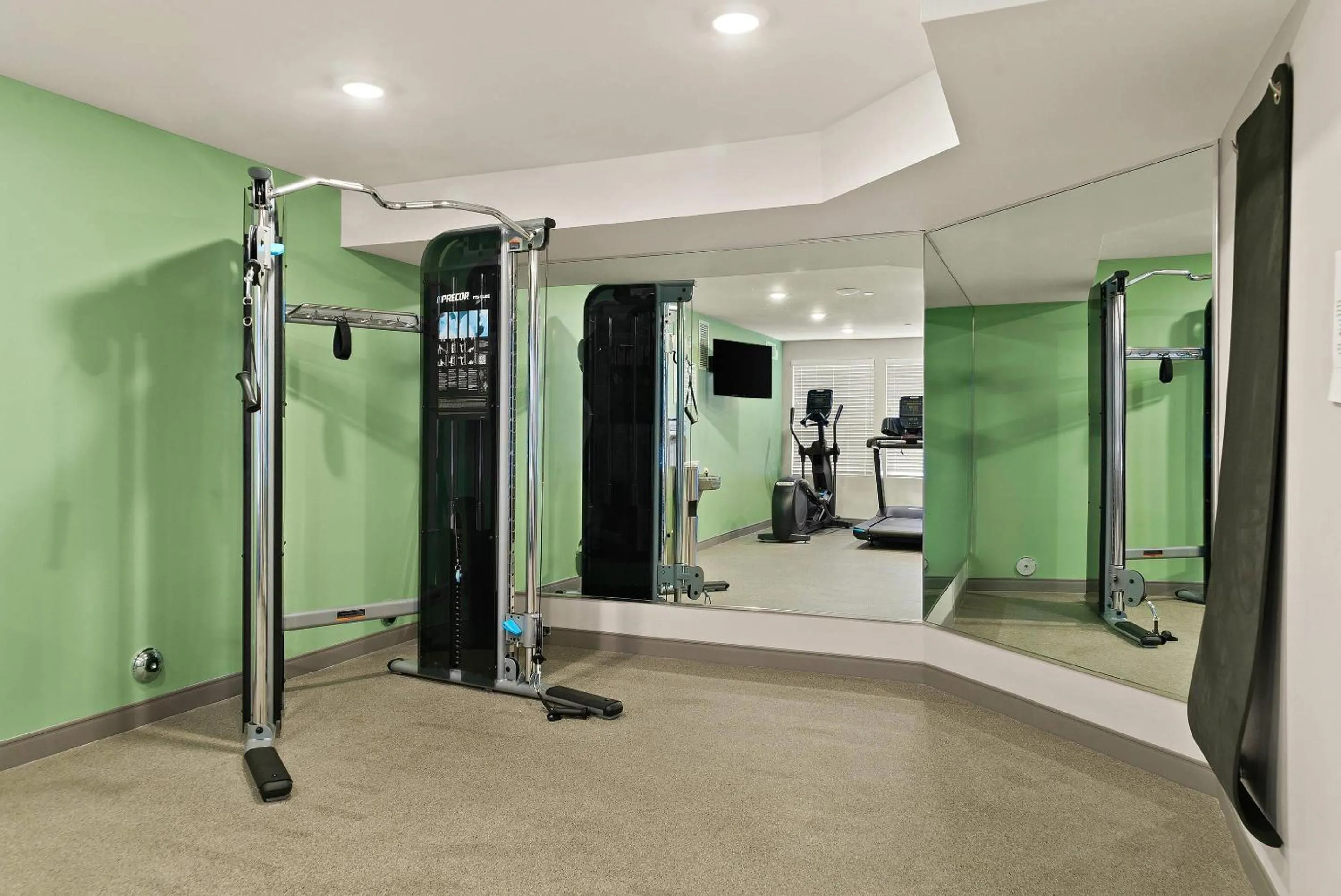 Fitness centre/facilities in WoodSpring Suites East Lansing - University Area