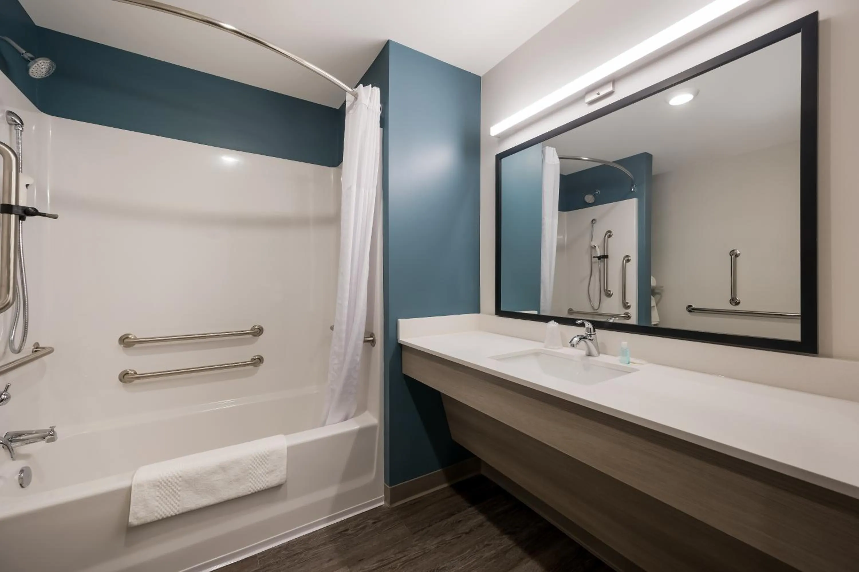 Bathroom in WoodSpring Suites East Lansing - University Area