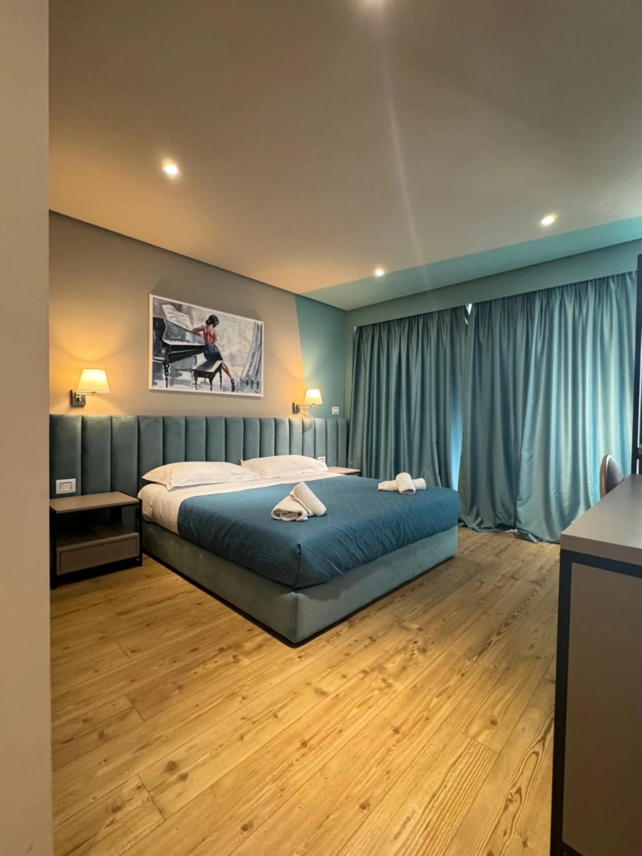 Bed in Festim Villa Hotel