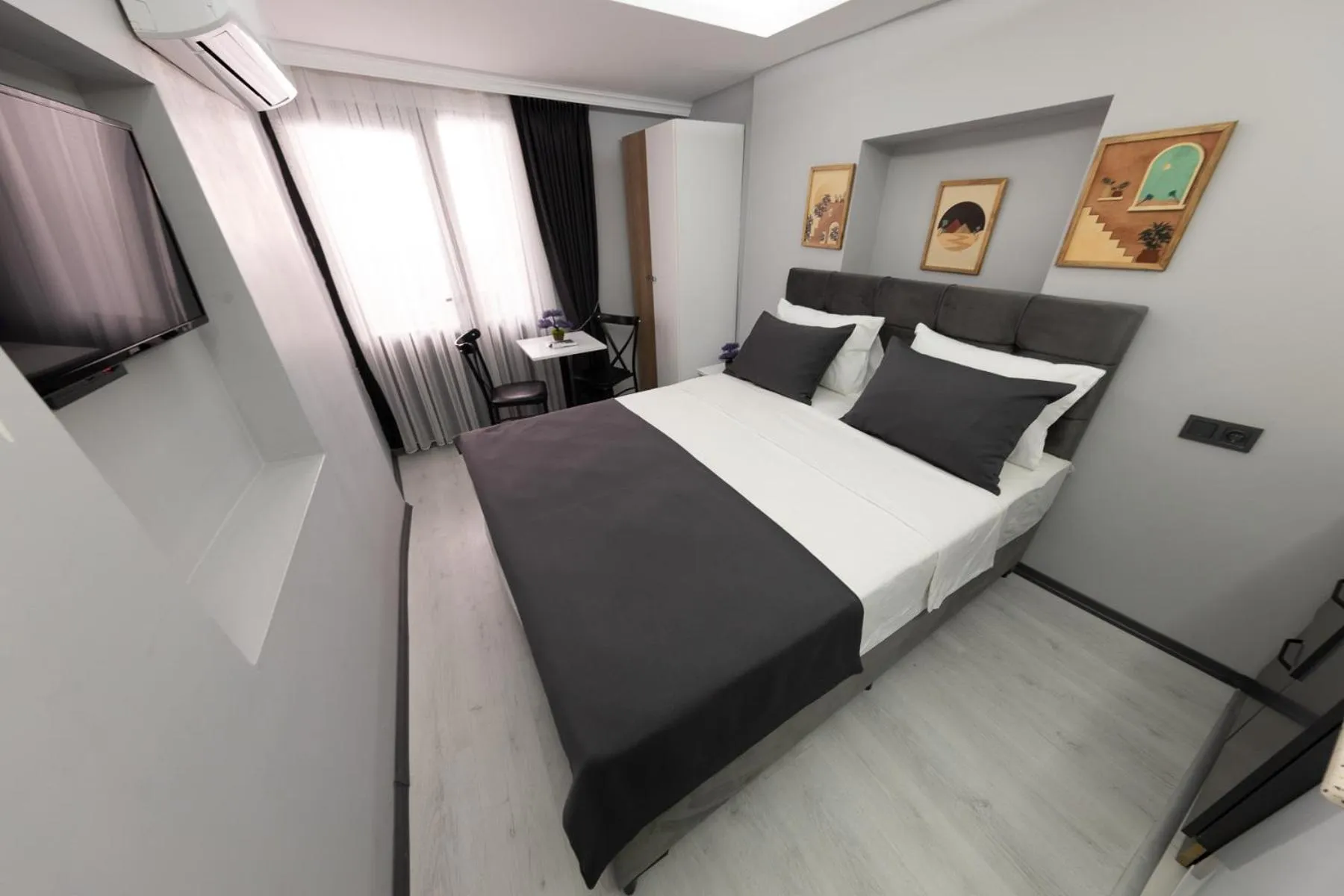 TV and multimedia, Bed in Aya Langa Guest House