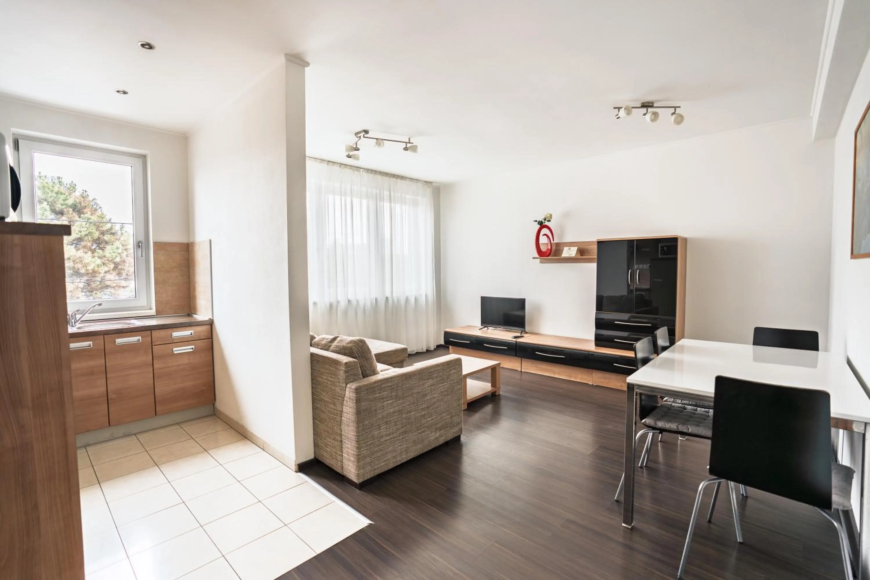 Kitchen or kitchenette in Fine Restaurant & Apartments