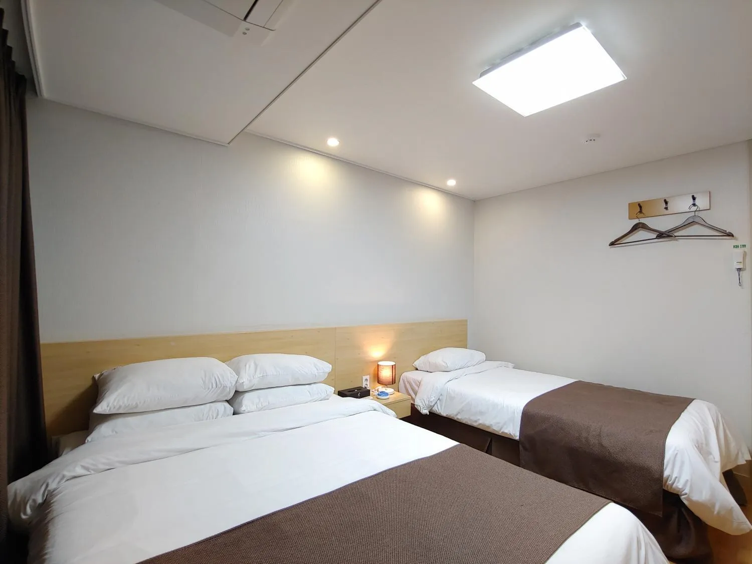 Bed in Jeju Lavender Hotel