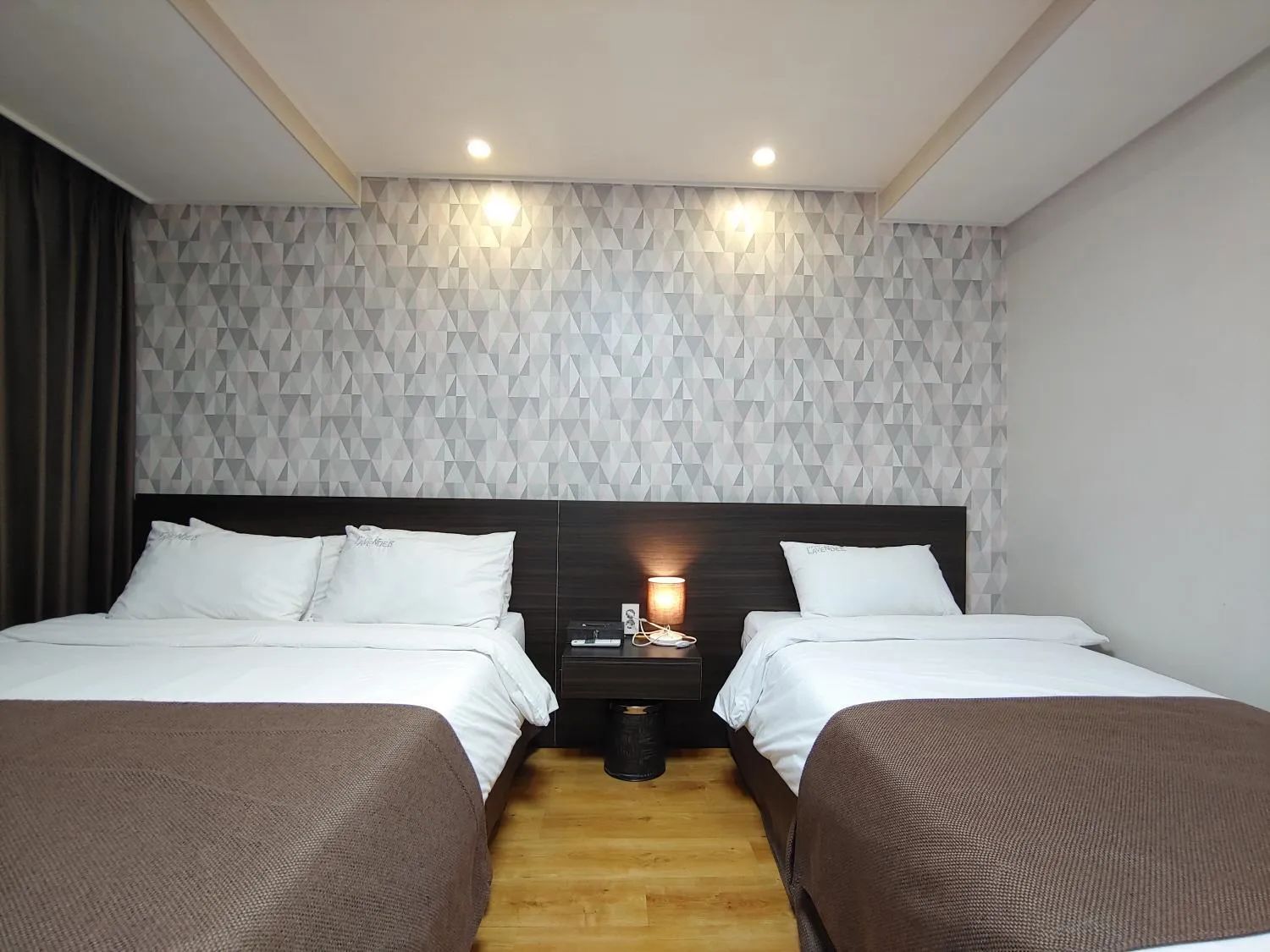 Bed in Jeju Lavender Hotel