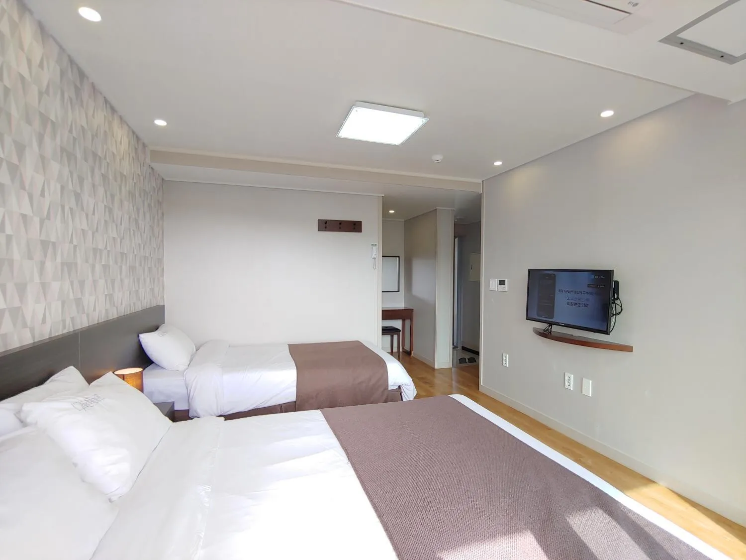 Bed in Jeju Lavender Hotel