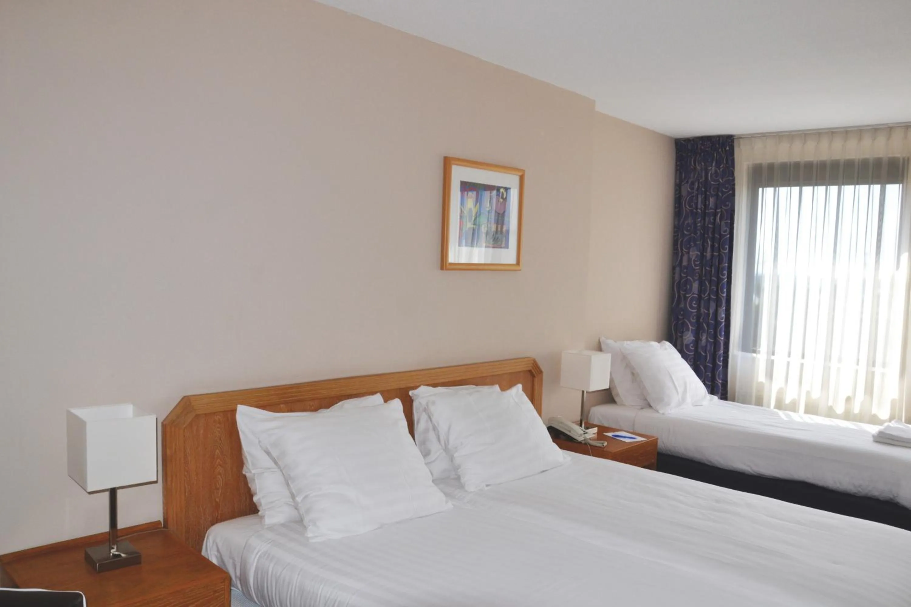 Bed in Fletcher Hotel Restaurant Carlton