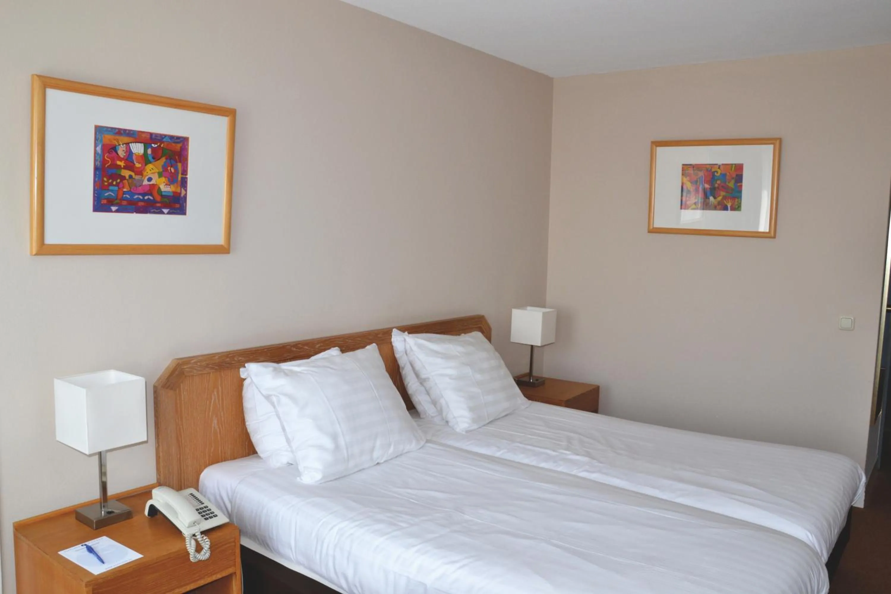 Bed in Fletcher Hotel Restaurant Carlton