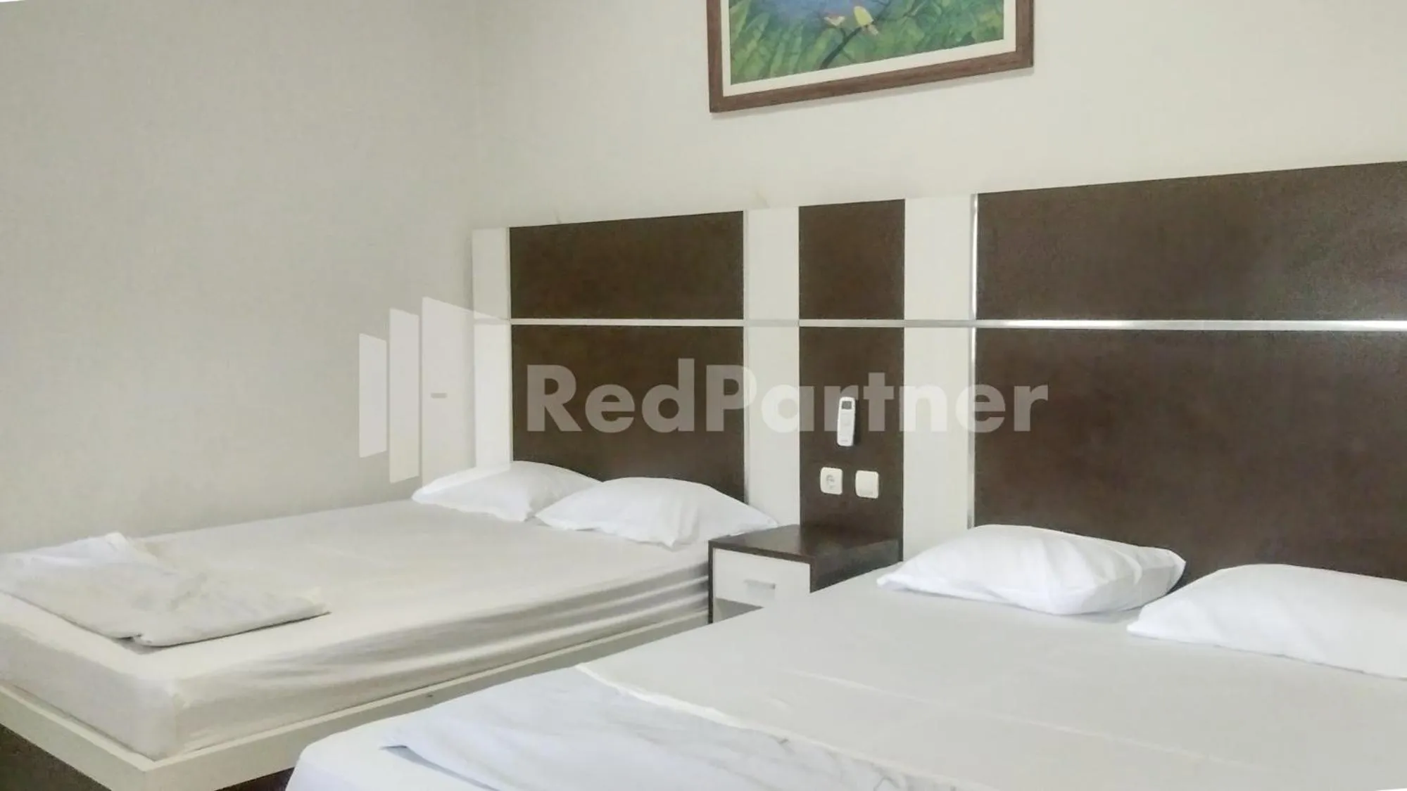 Bed in The SO Hotel Mitra RedDoorz