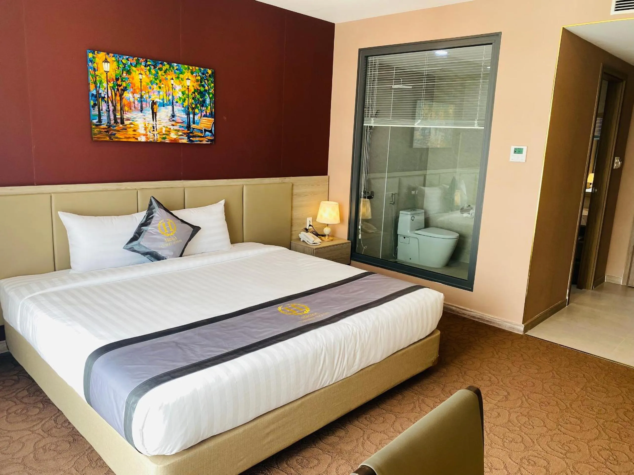 Bed in Hera Luxury Hotel