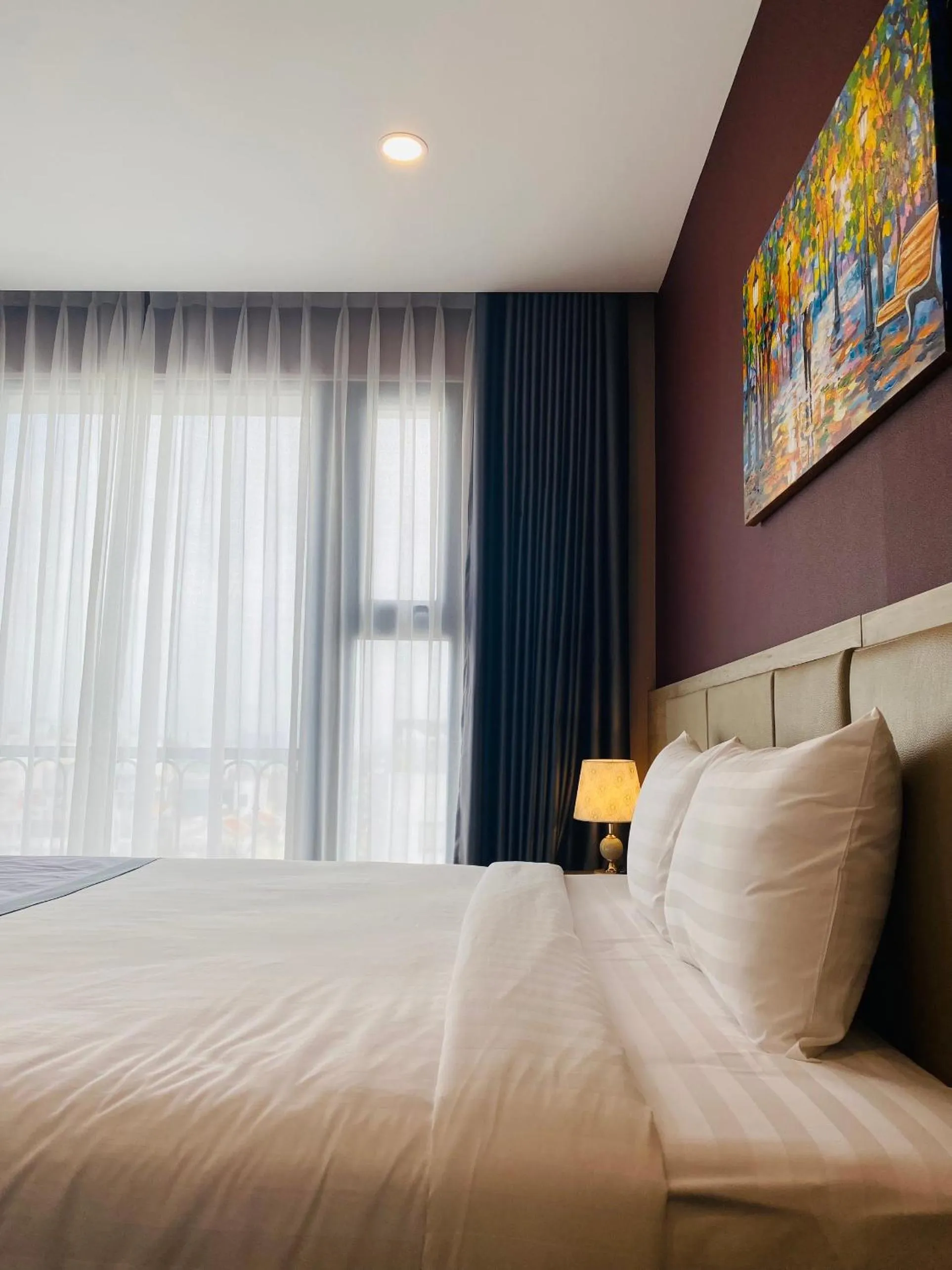 Bed in Hera Luxury Hotel