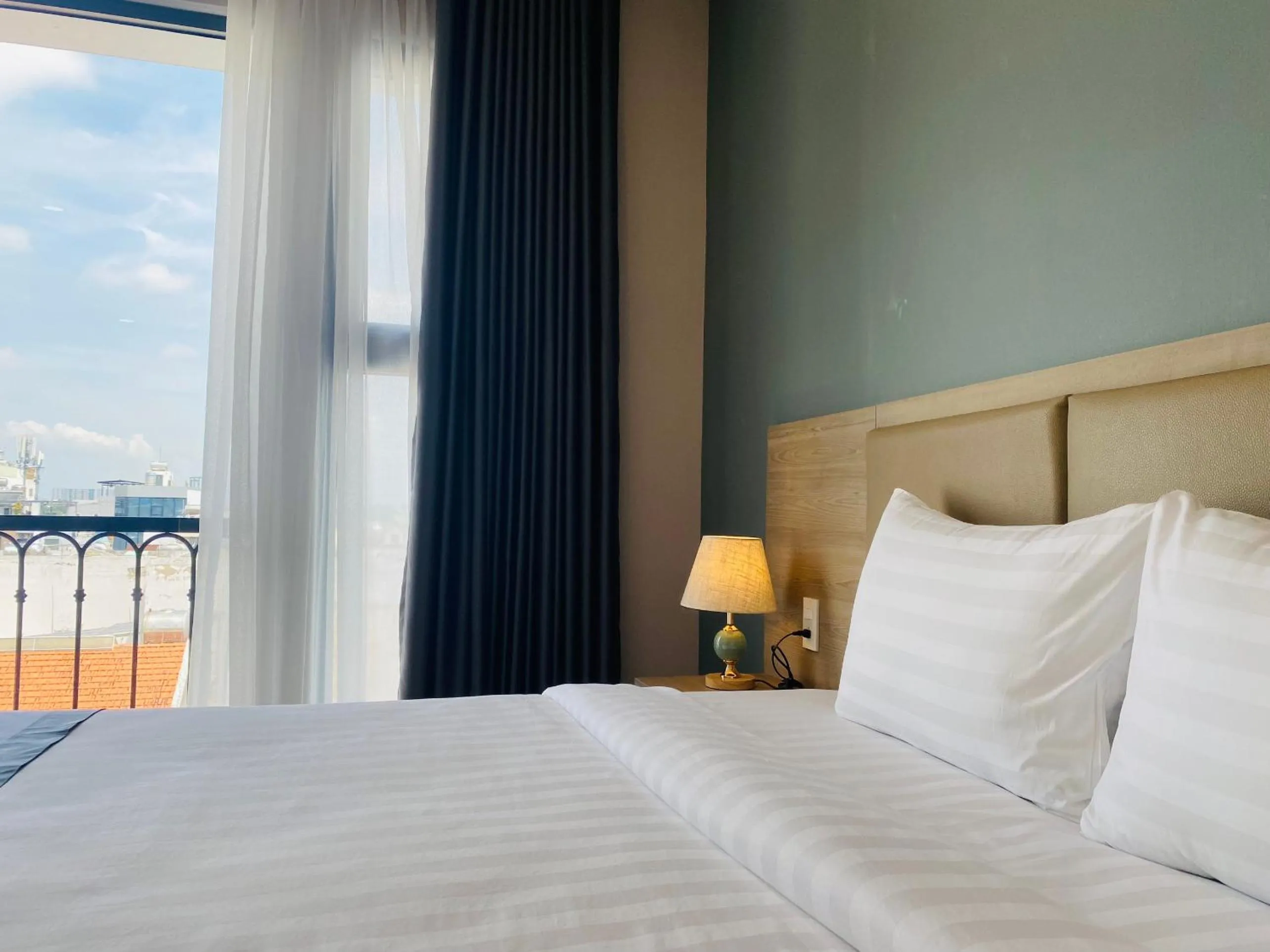 Bed in Hera Luxury Hotel