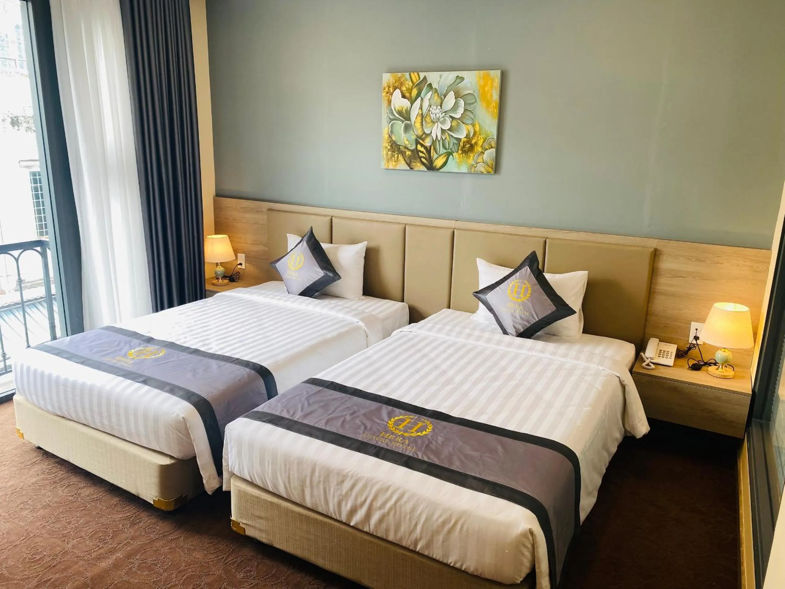 Bed in Hera Luxury Hotel
