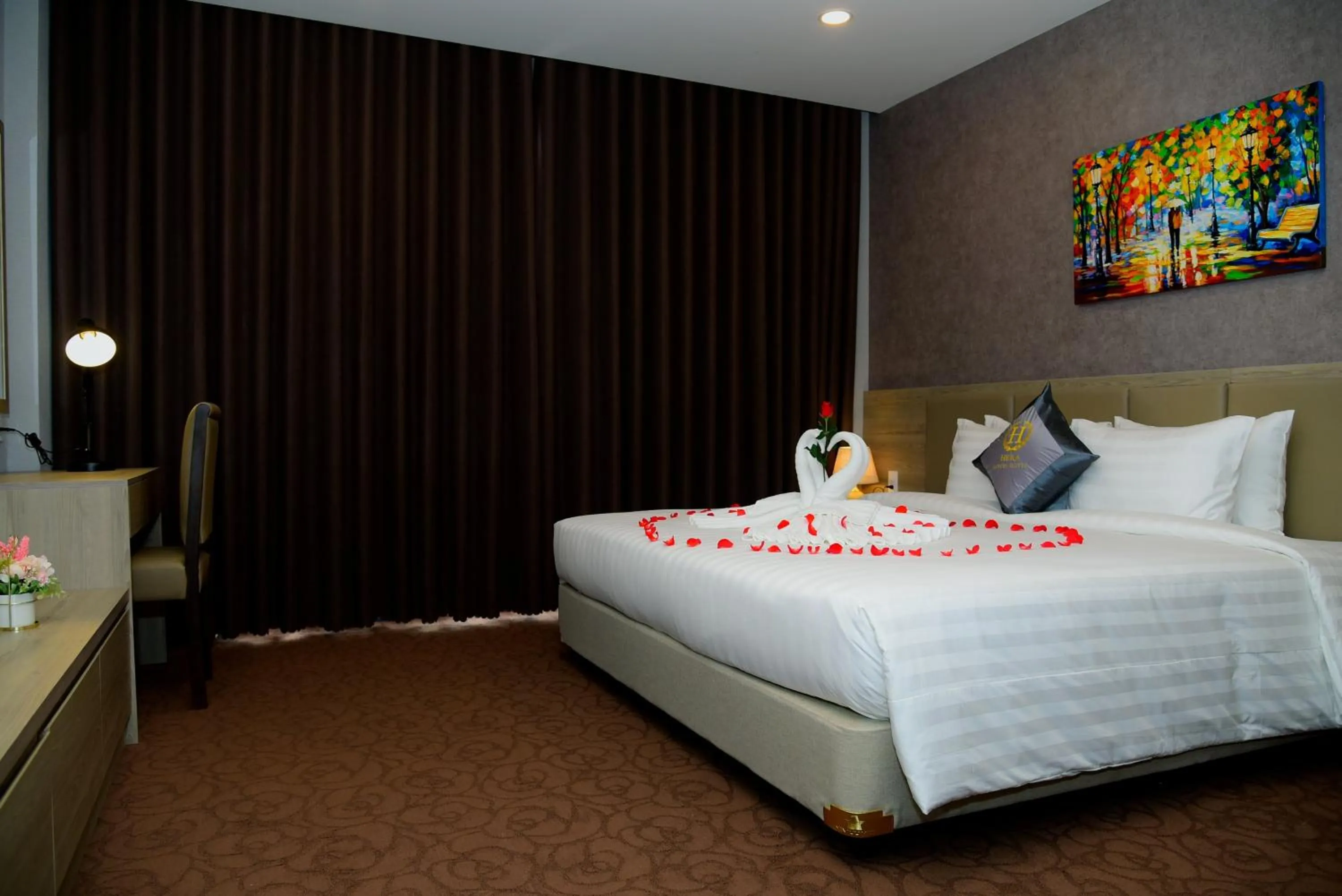 Bed in Hera Luxury Hotel