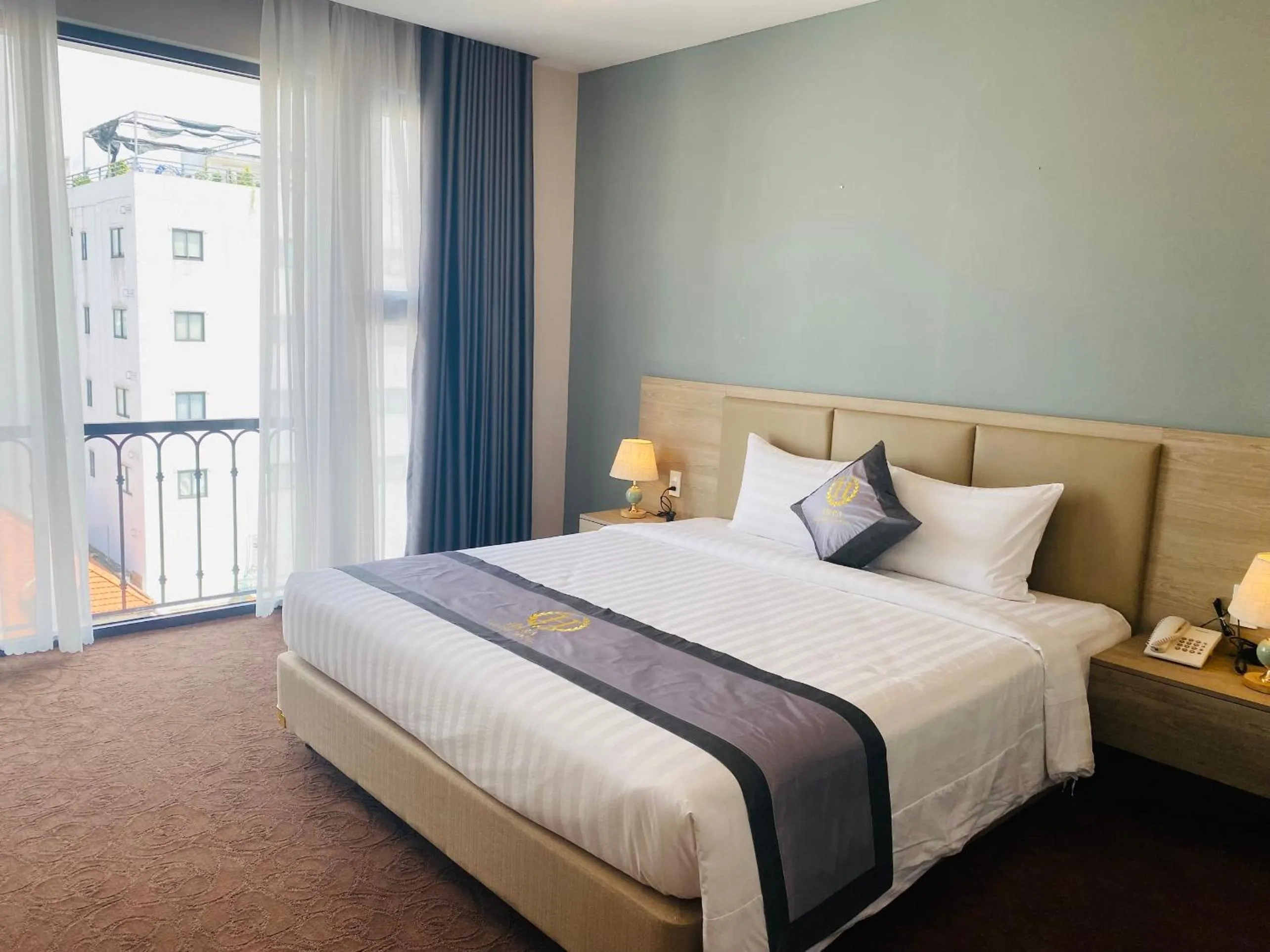 Bed in Hera Luxury Hotel