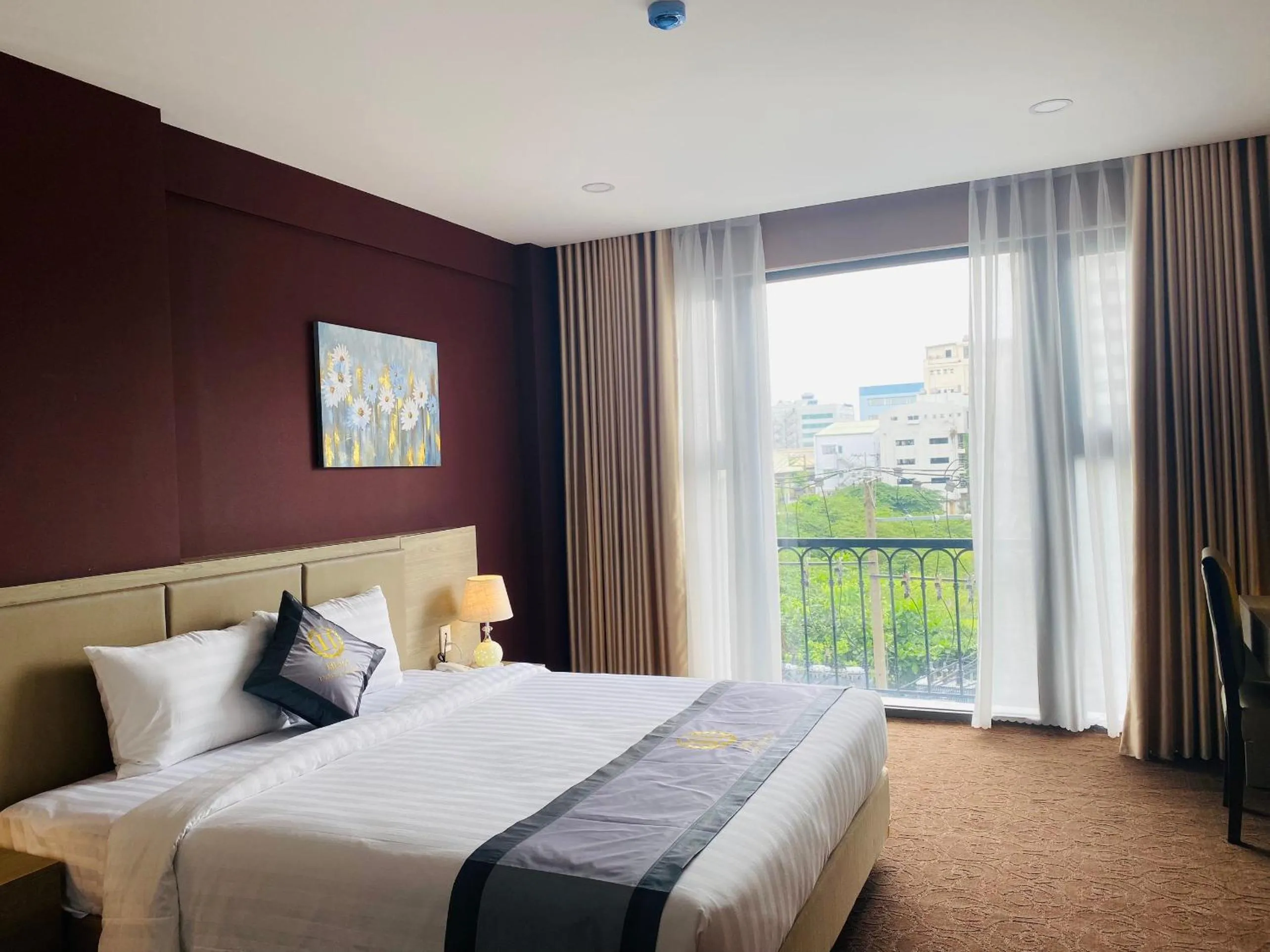 Bed in Hera Luxury Hotel