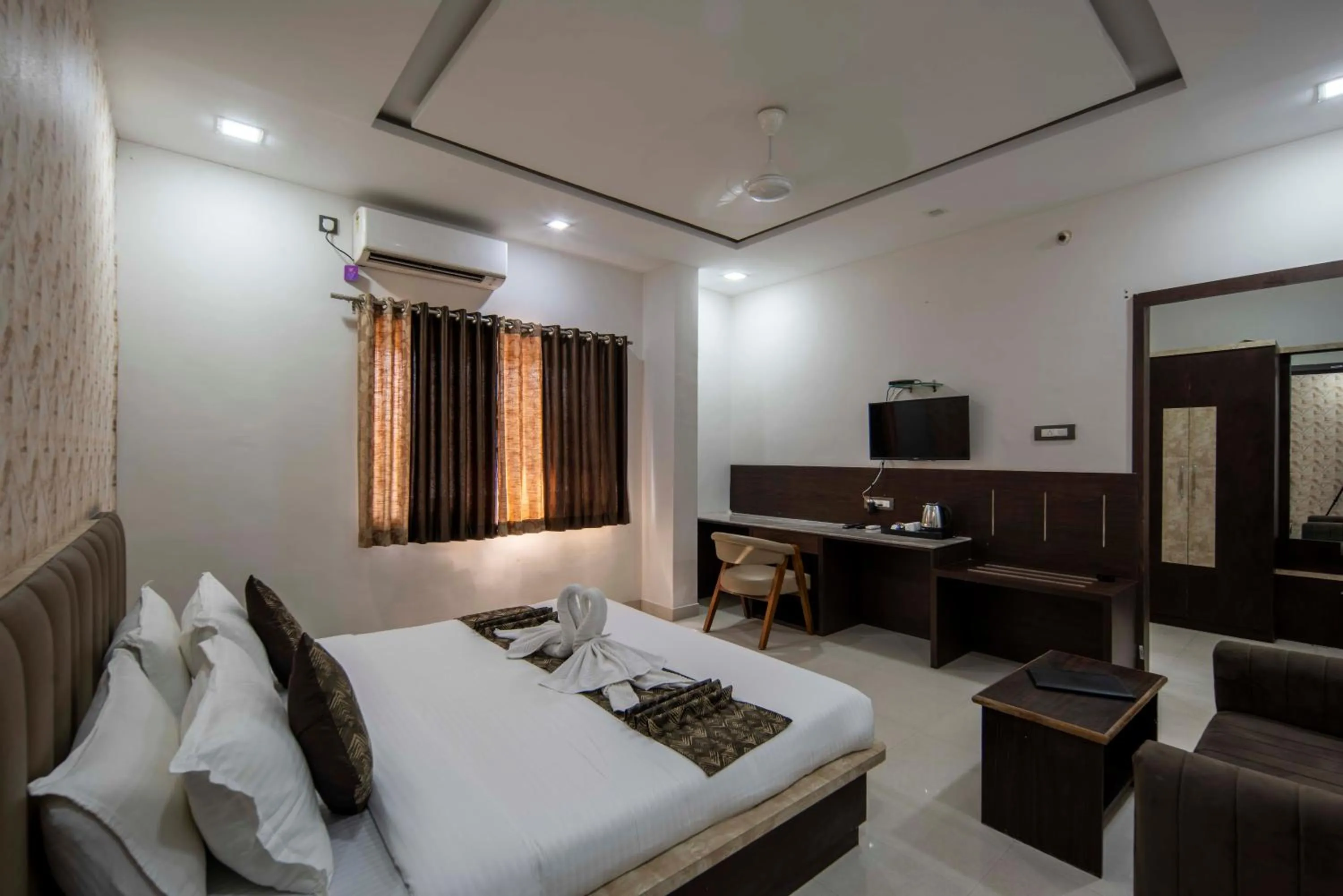 Bed in Hotel Bafna Lawn