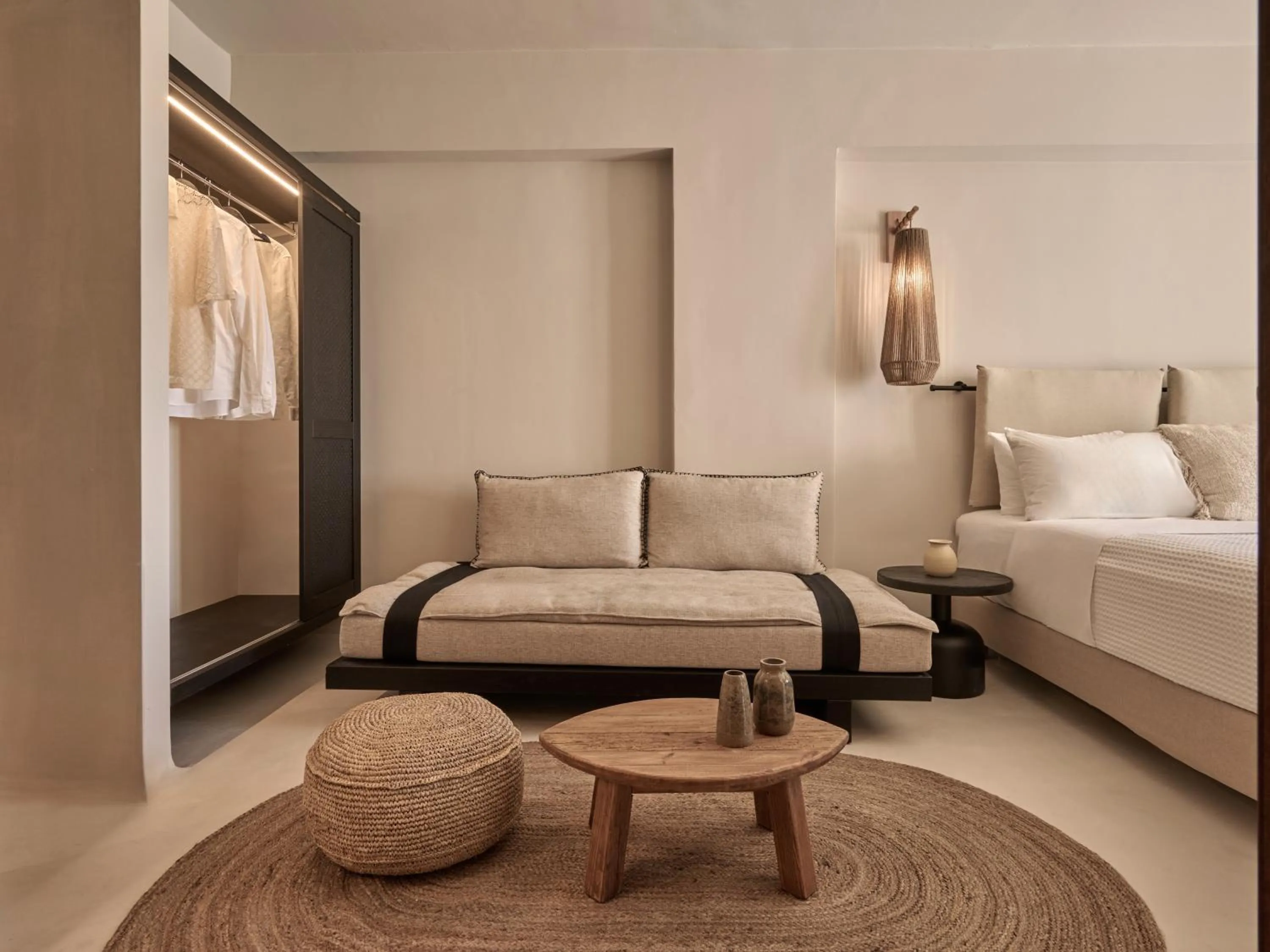 Seating area, Bed in Utopia Hotel