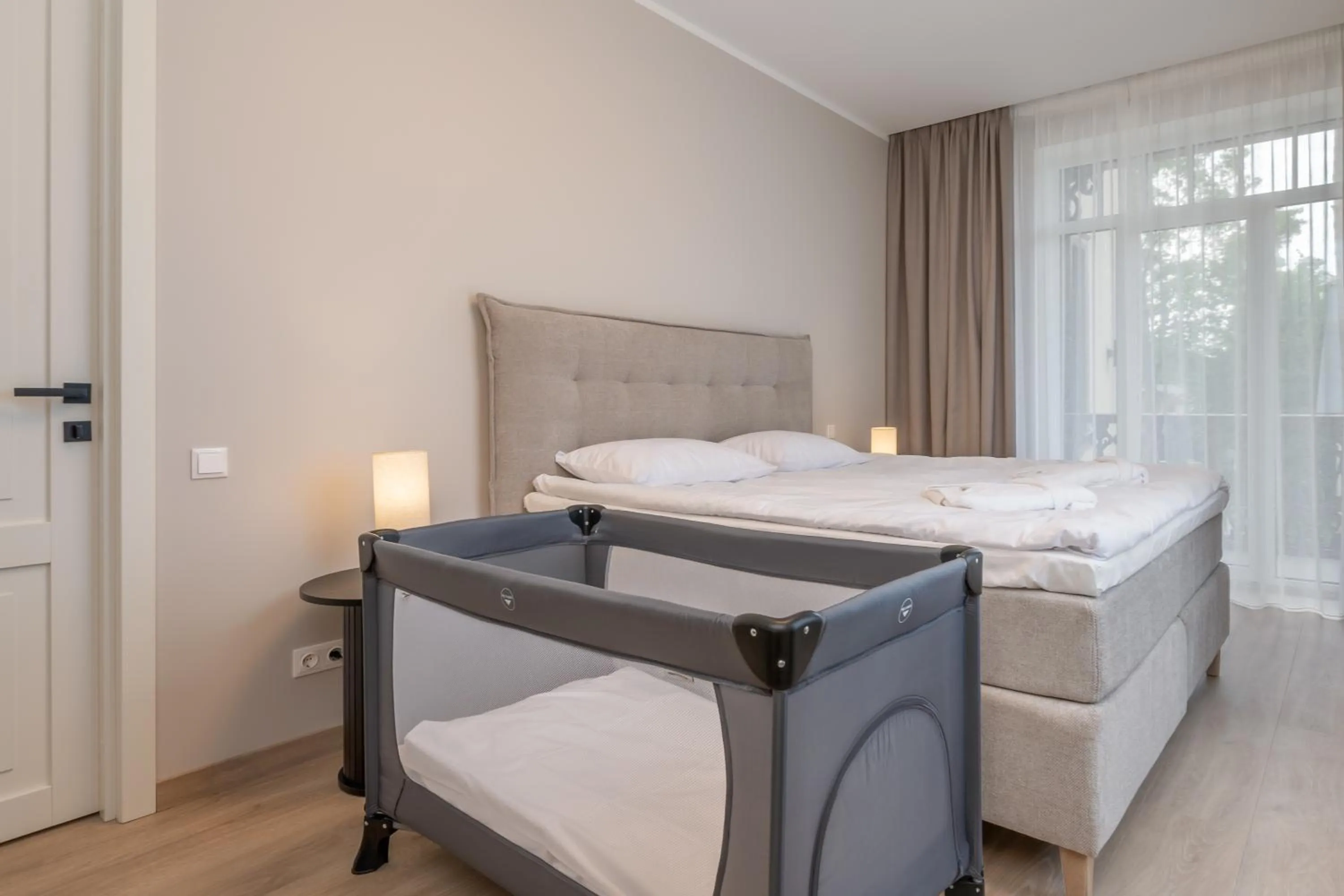 Bed in STORIES Design ApartHotel