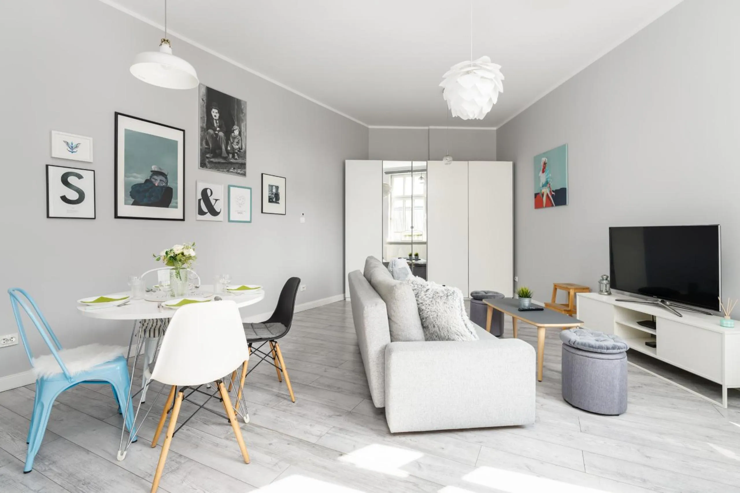Communal lounge/ TV room in Scandi Małe Garbary Apartment Piaskowa near Old Market Square by Noclegi Renters