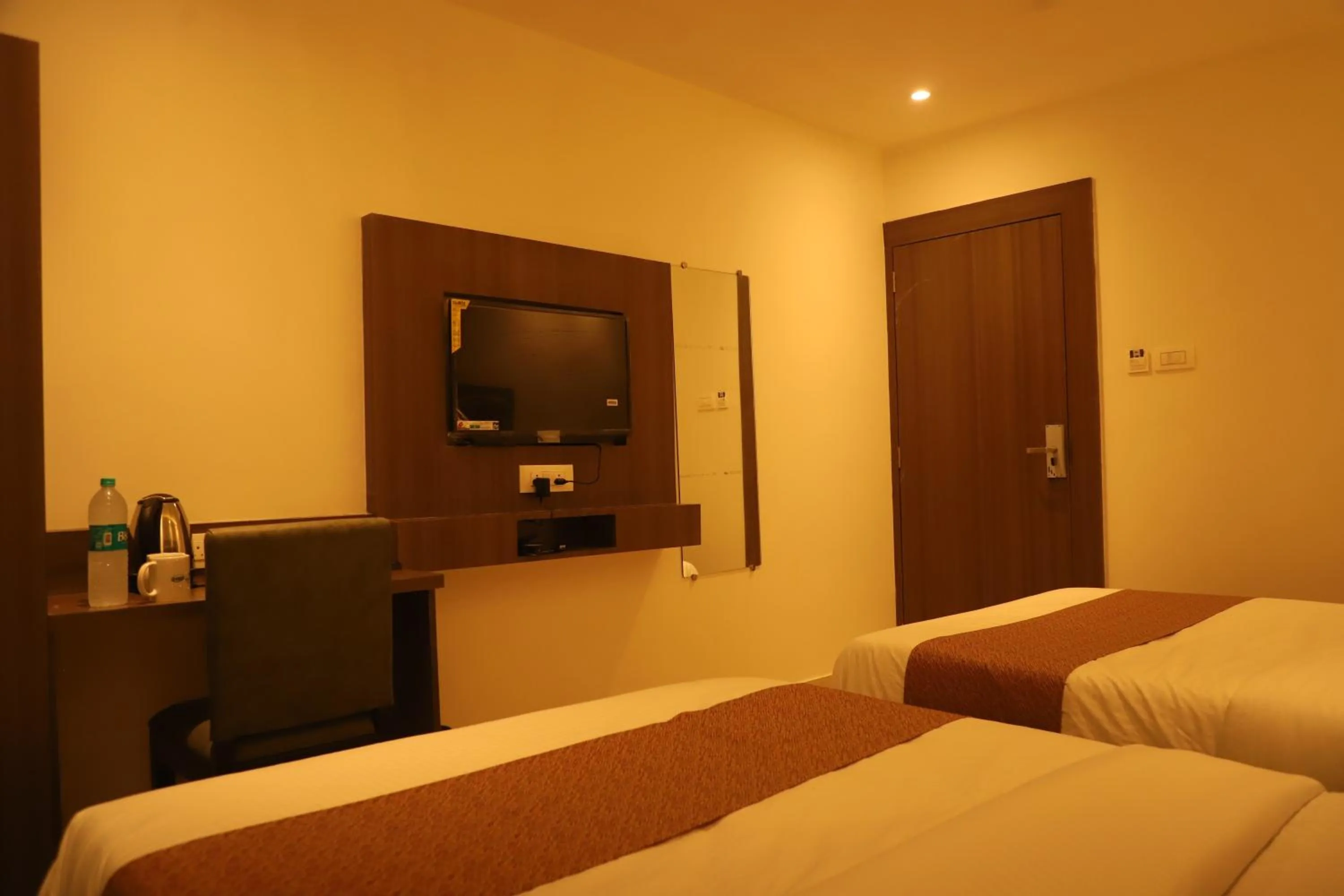 TV and multimedia, Bed in Hotel Sai Pritam