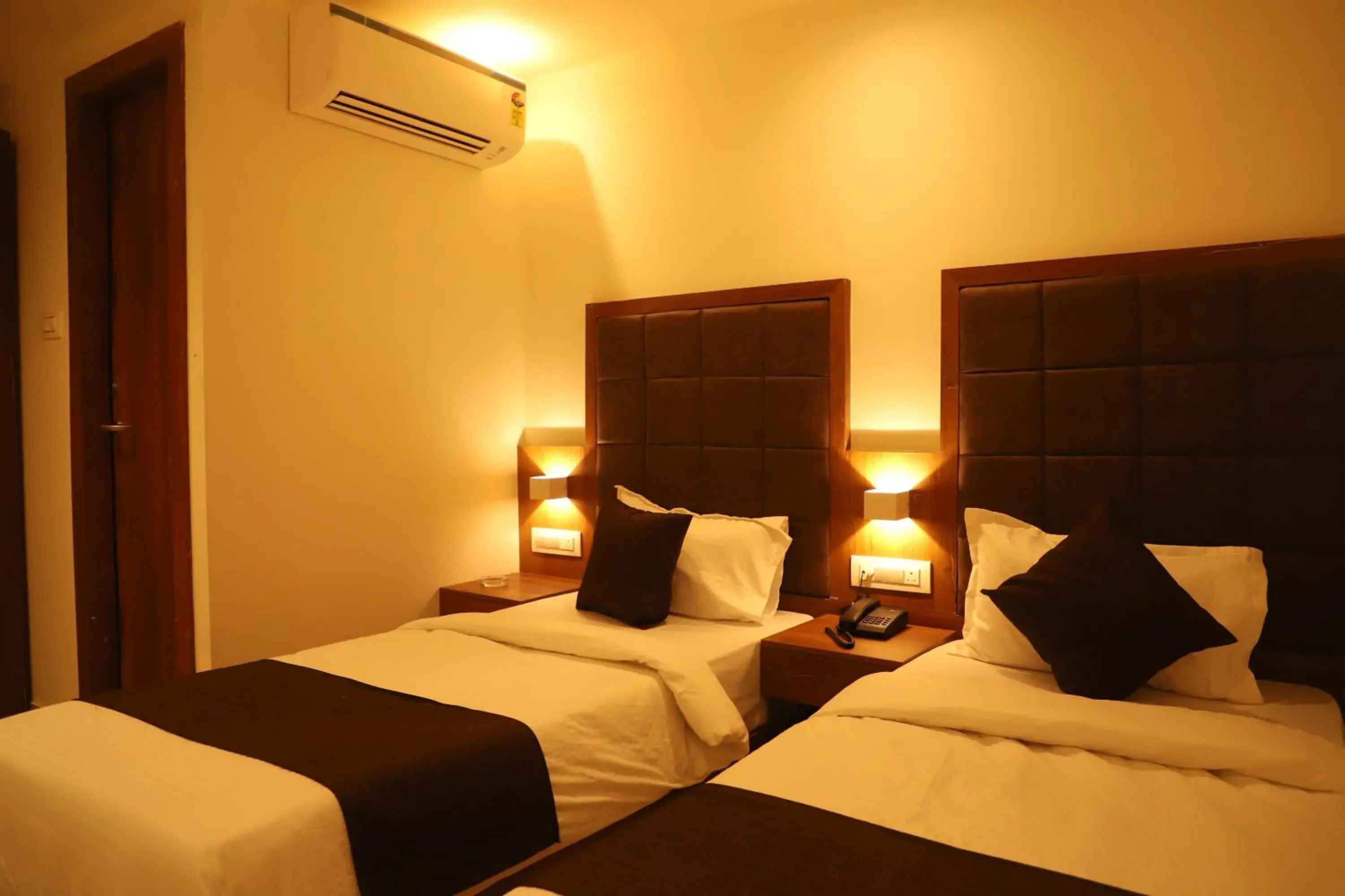 Twin Room with Private Bathroom in Hotel Sai Pritam Twin Room with Private Bathroom in Hotel Sai Pritam