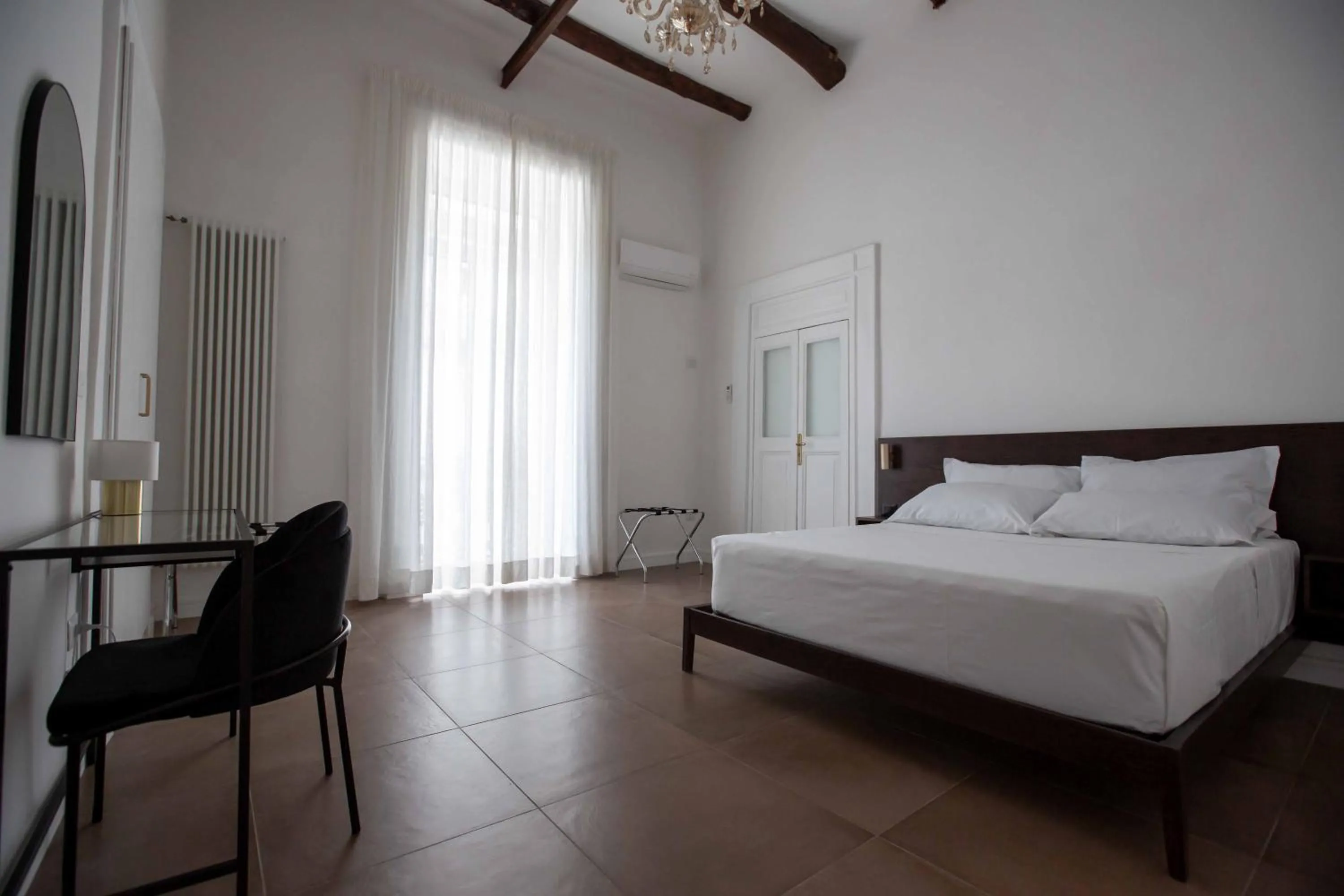 Bed in Domus Delia Luxury Apartment