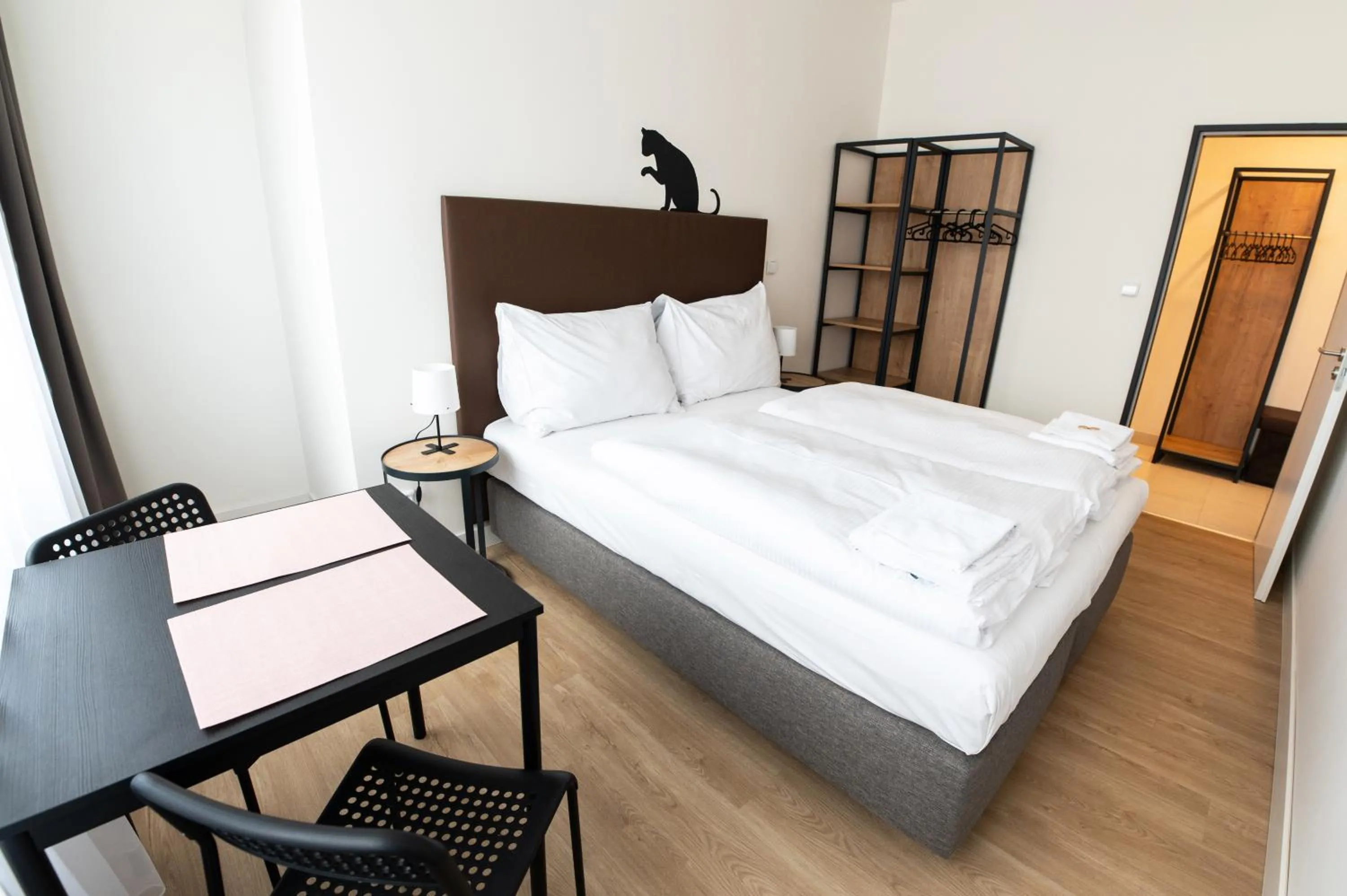 Bed in Post 120 Suites