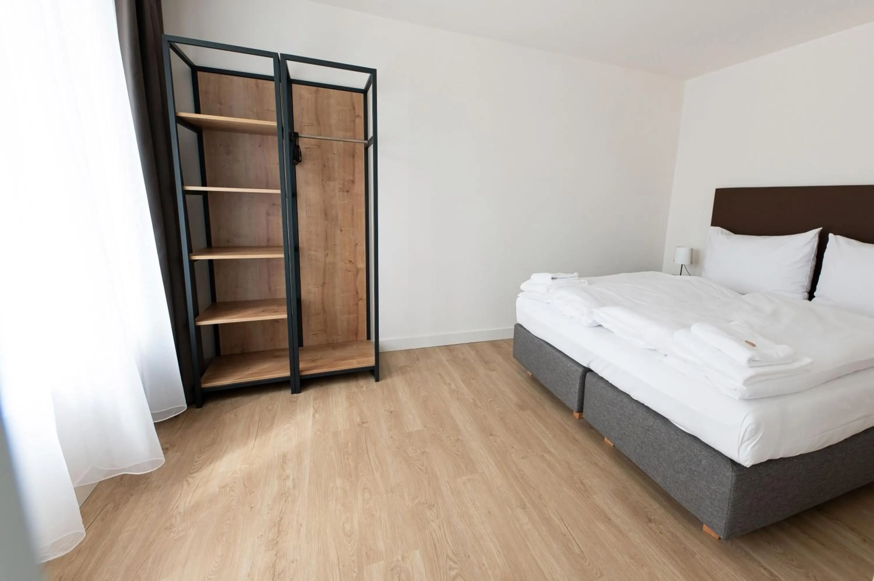 Bed in Post 120 Suites