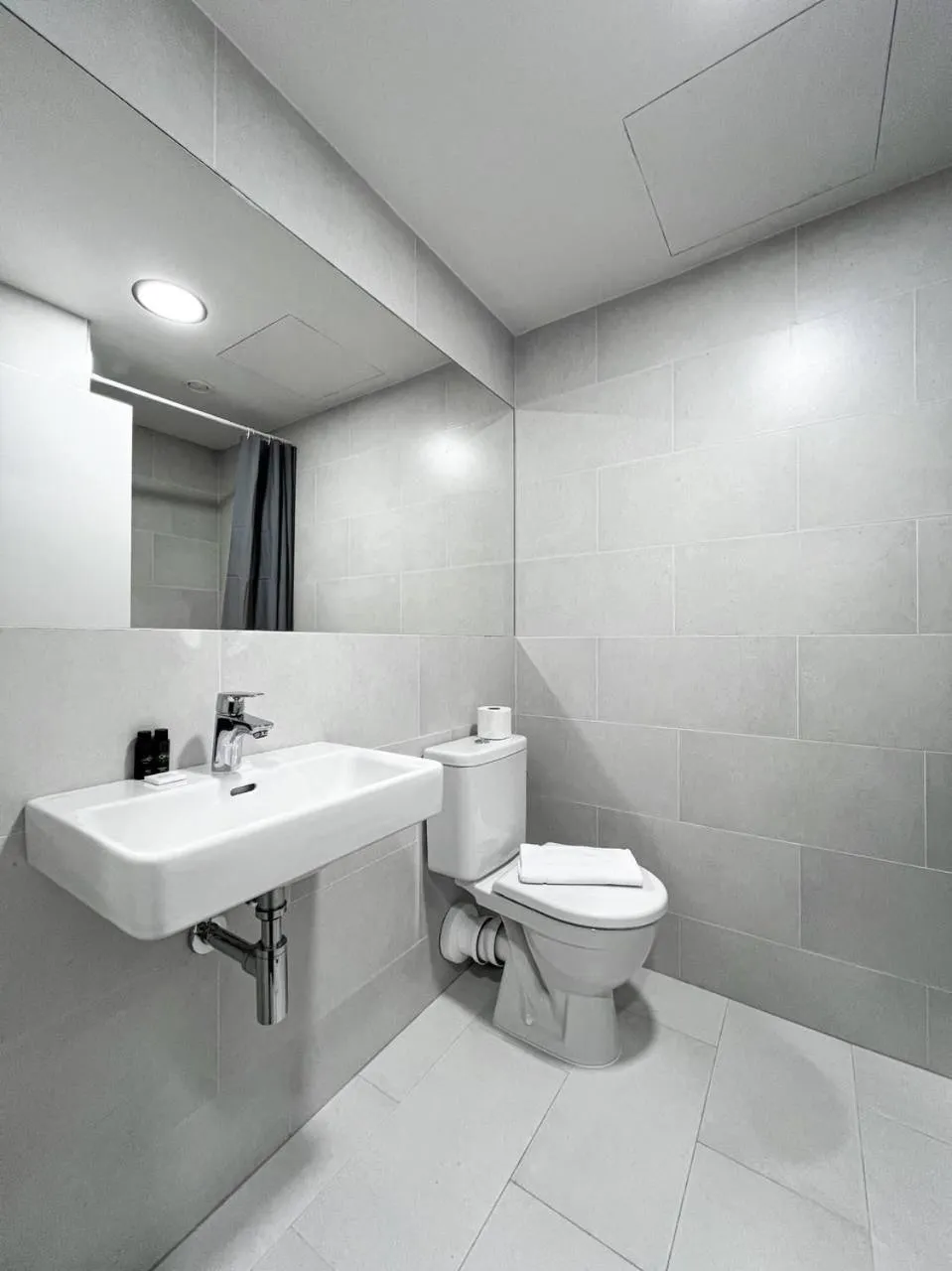 Toilet in Post 120 Suites