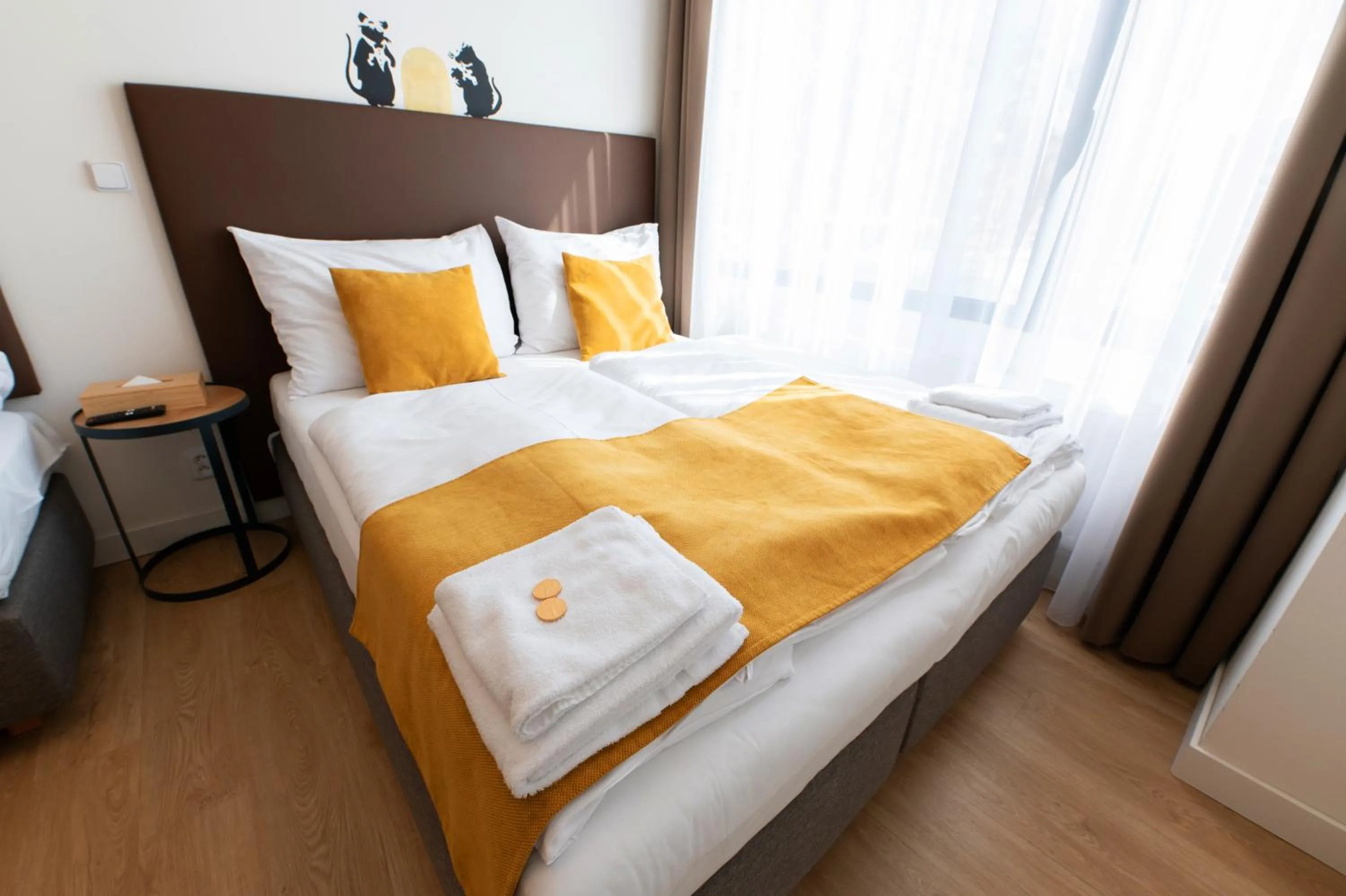 Bed in Post 120 Suites