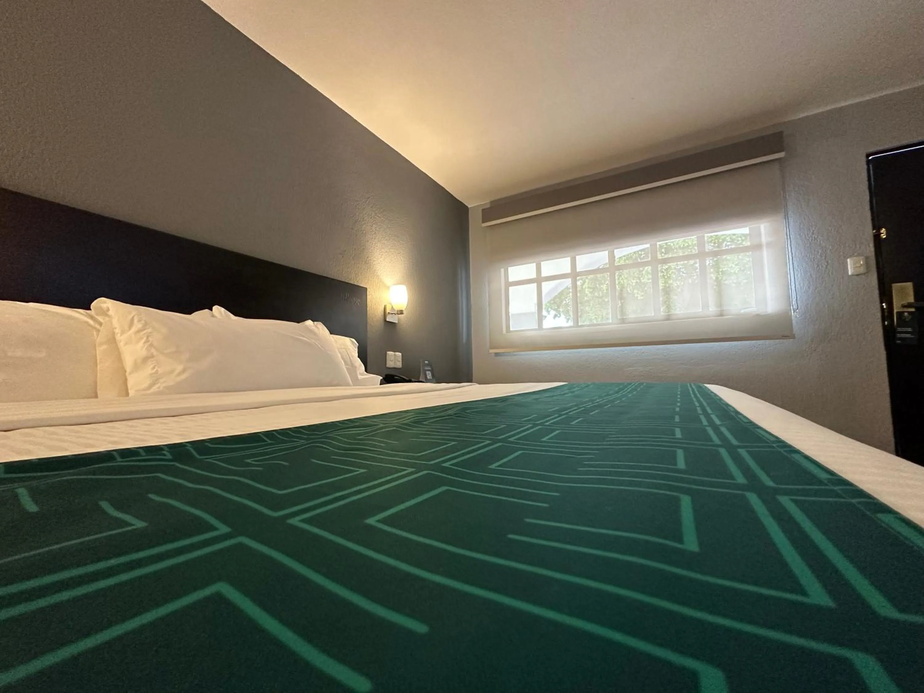 Bed in InHouse Hotel Obregón