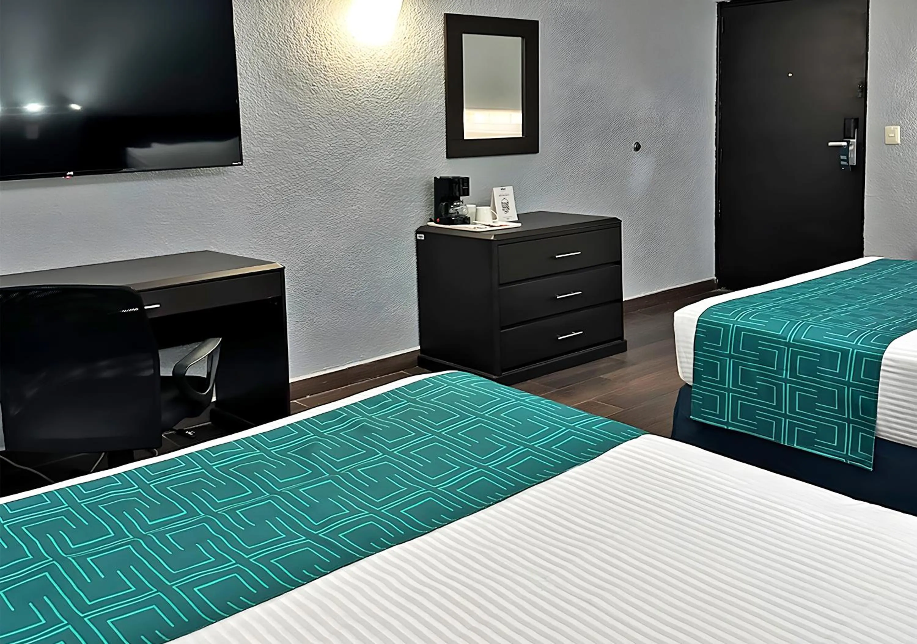 Bed in InHouse Hotel Obregón