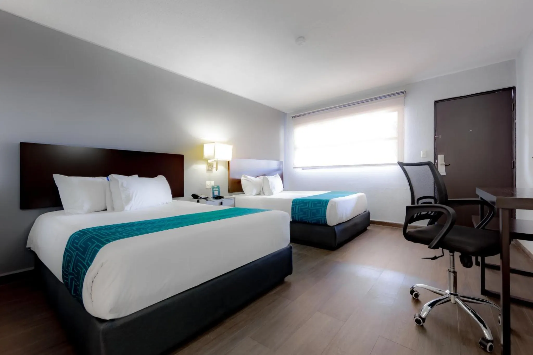 Bed in InHouse Hotel Obregón