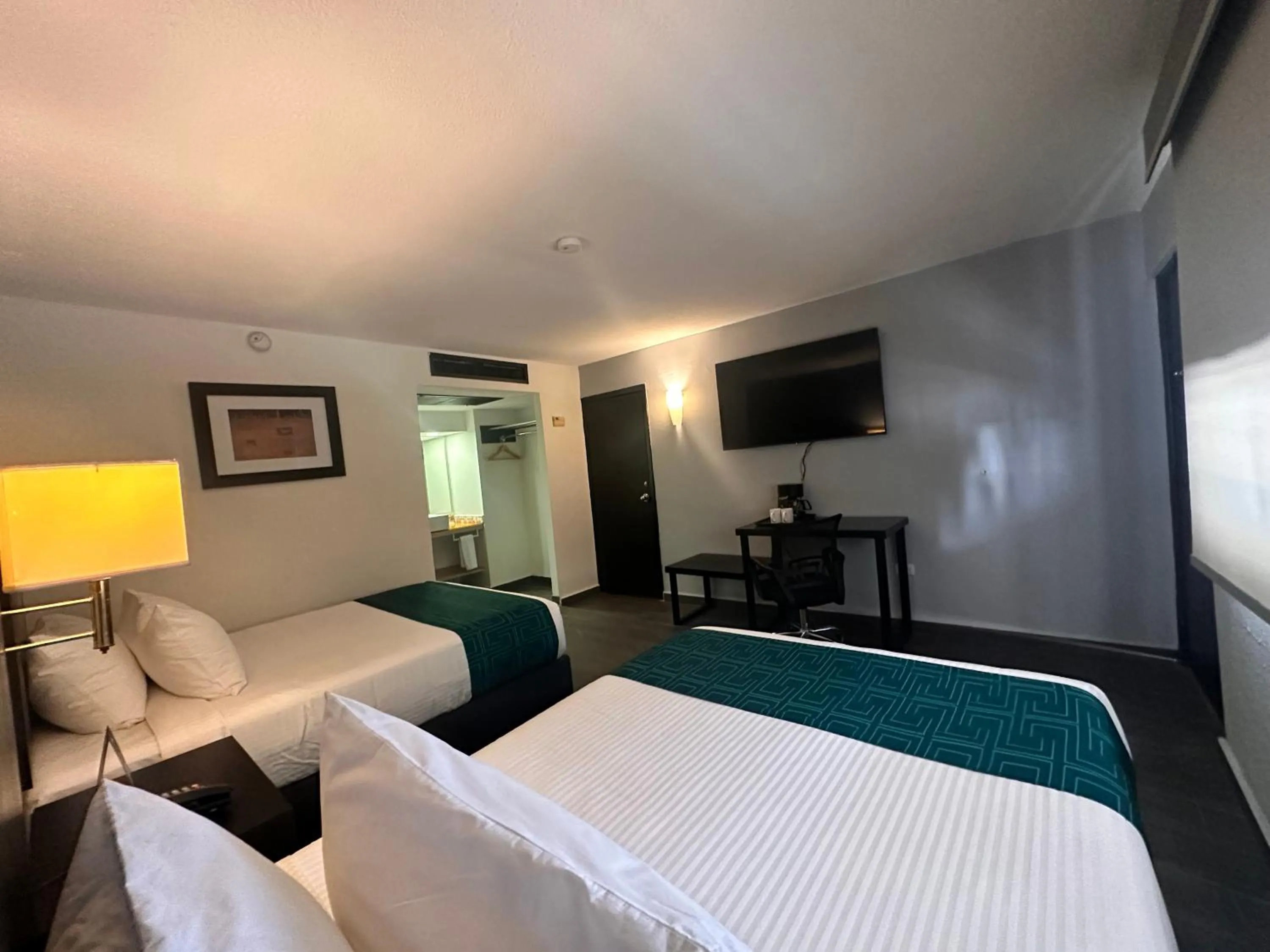 Bed in InHouse Hotel Obregón