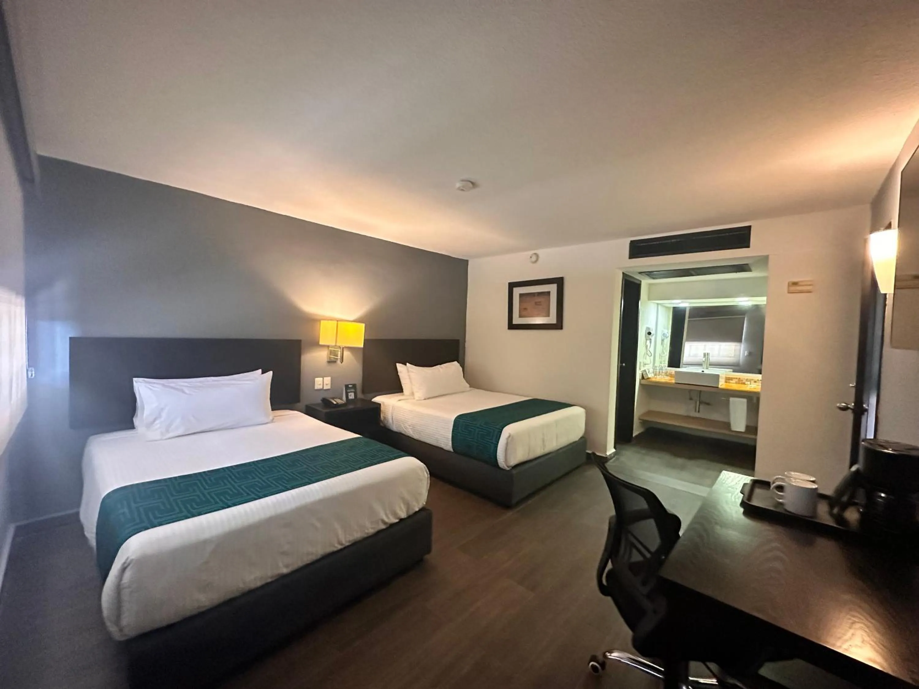 Bed in InHouse Hotel Obregón