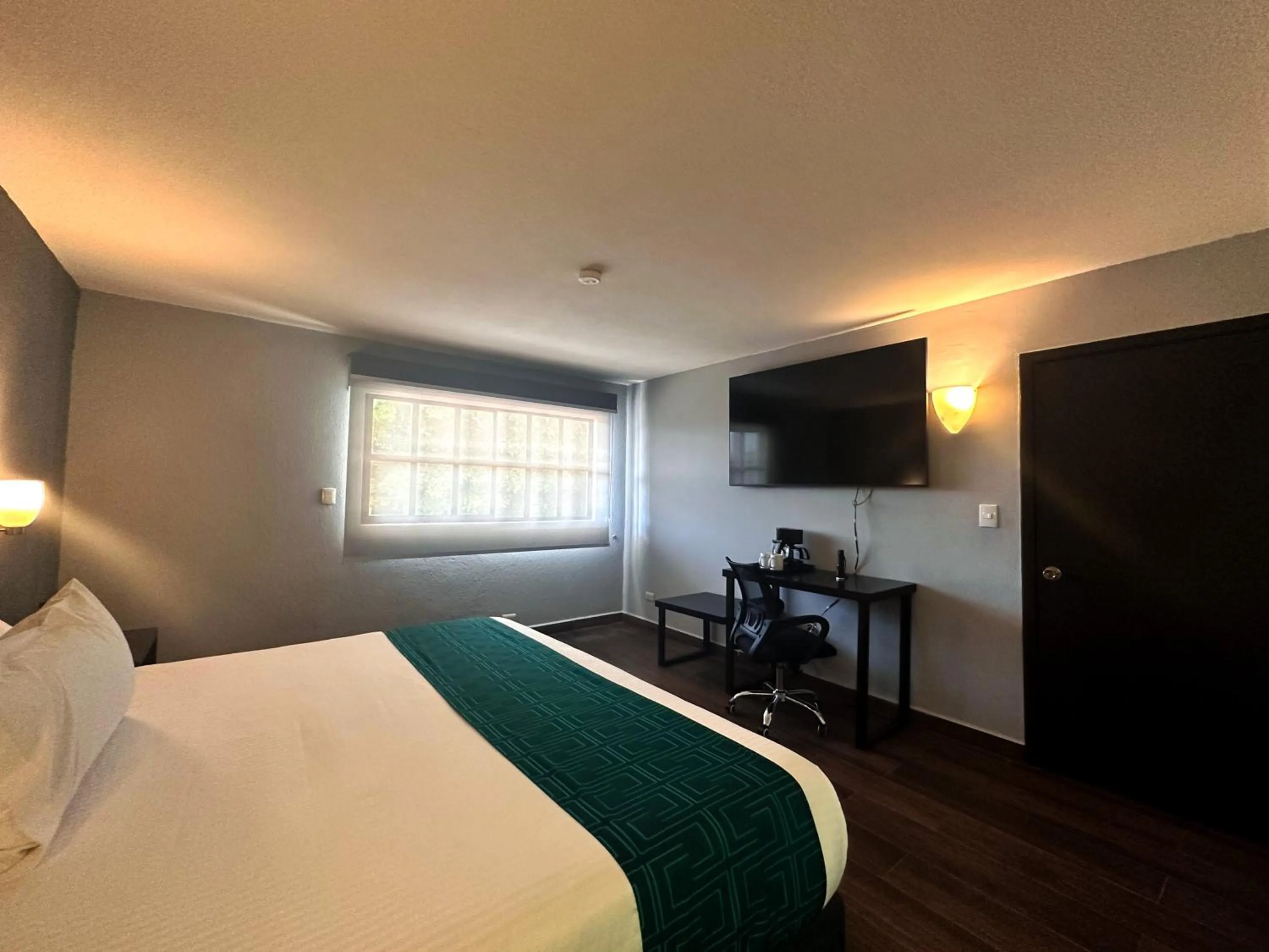 Bed in InHouse Hotel Obregón