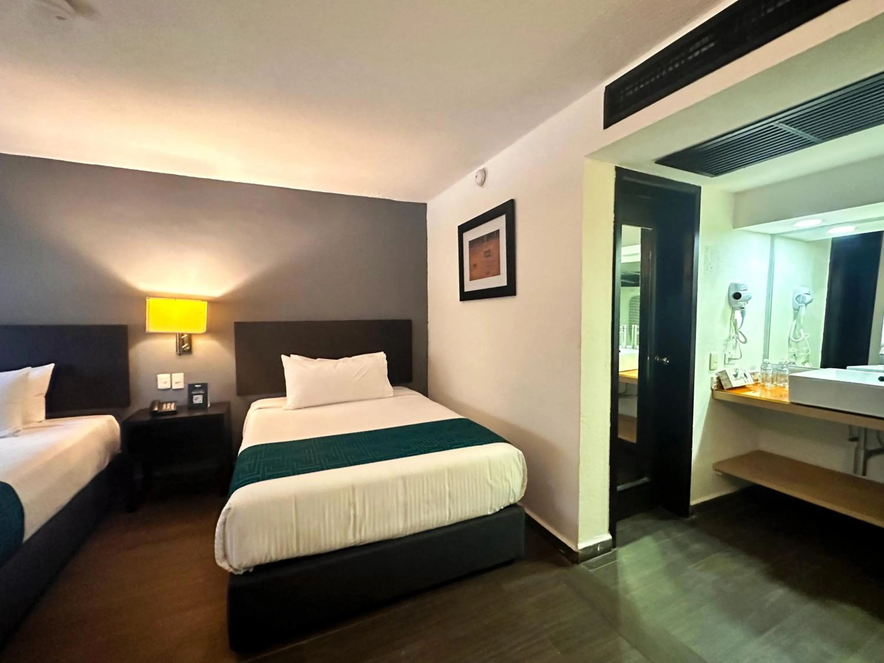 Bed in InHouse Hotel Obregón