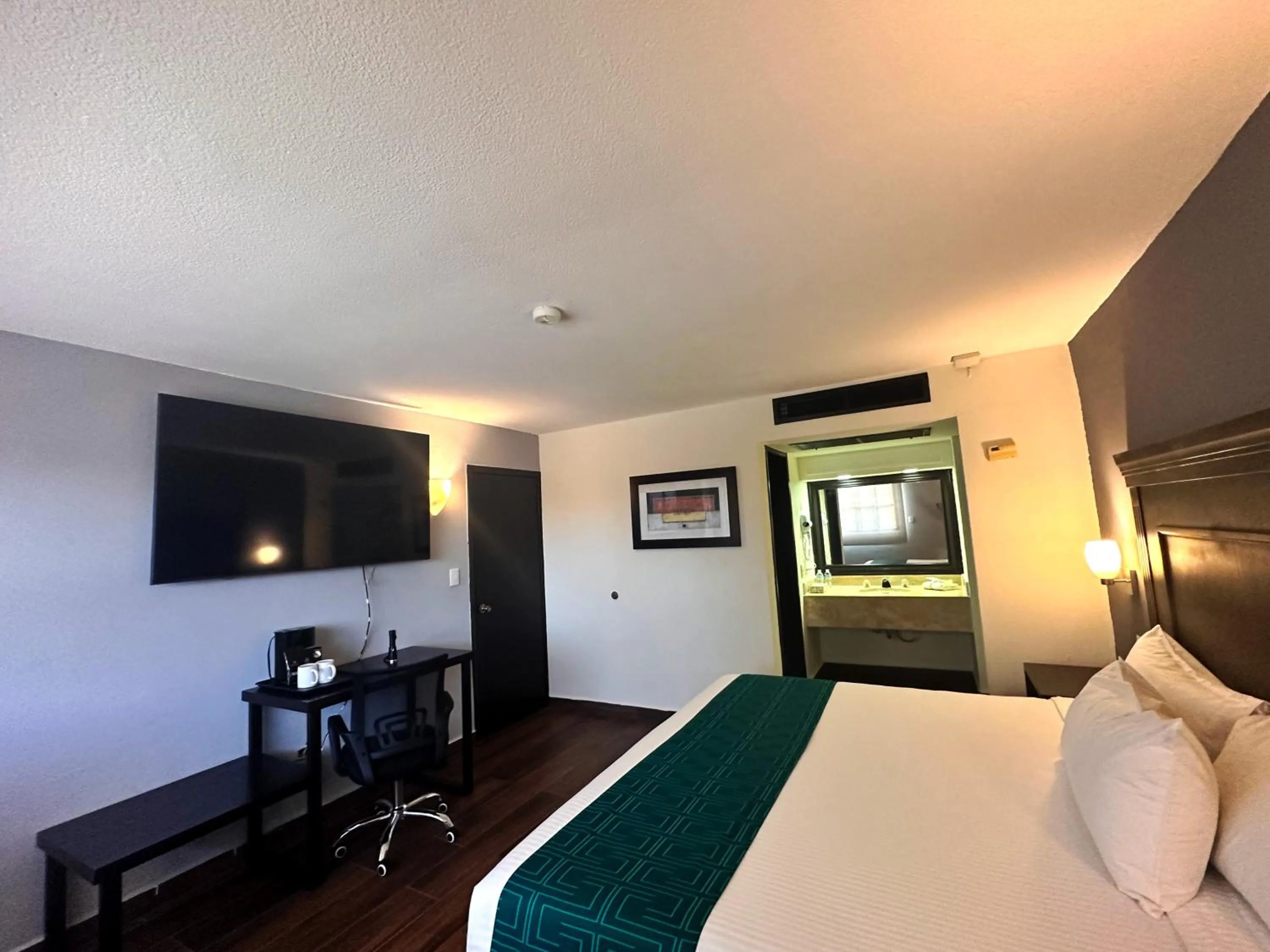 Bed in InHouse Hotel Obregón