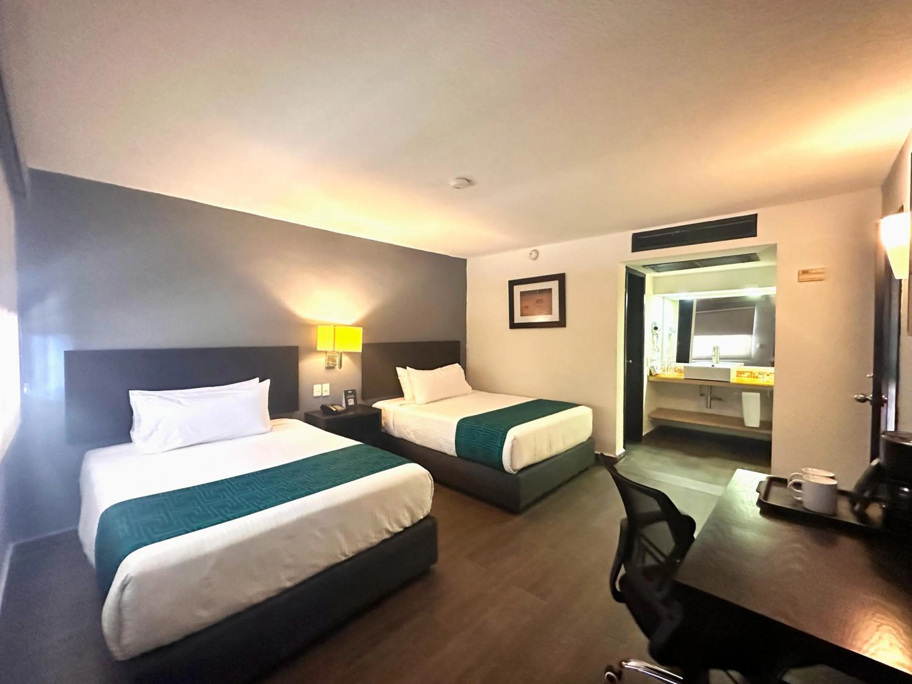 Bed in InHouse Hotel Obregón