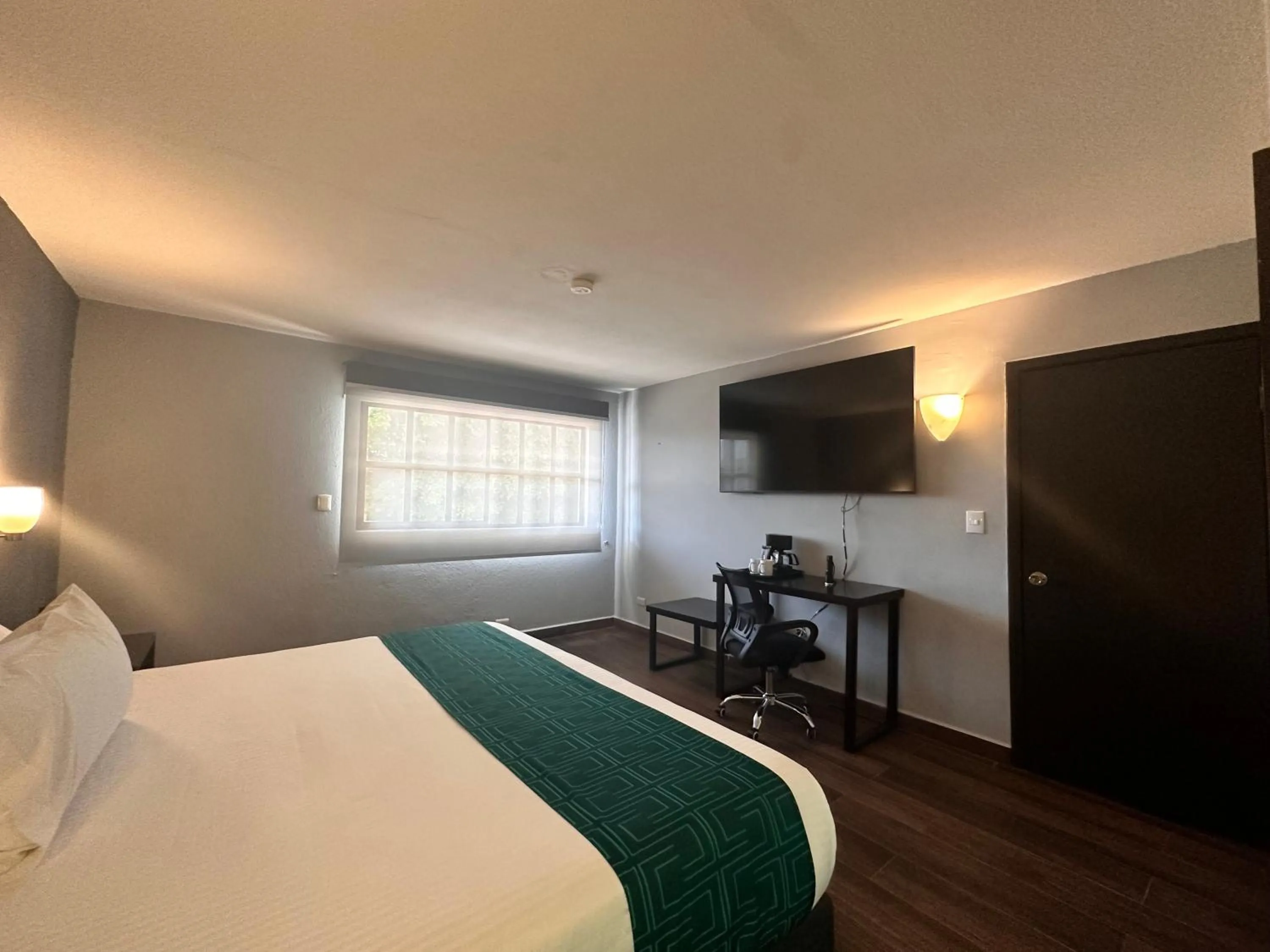 Bed in InHouse Hotel Obregón