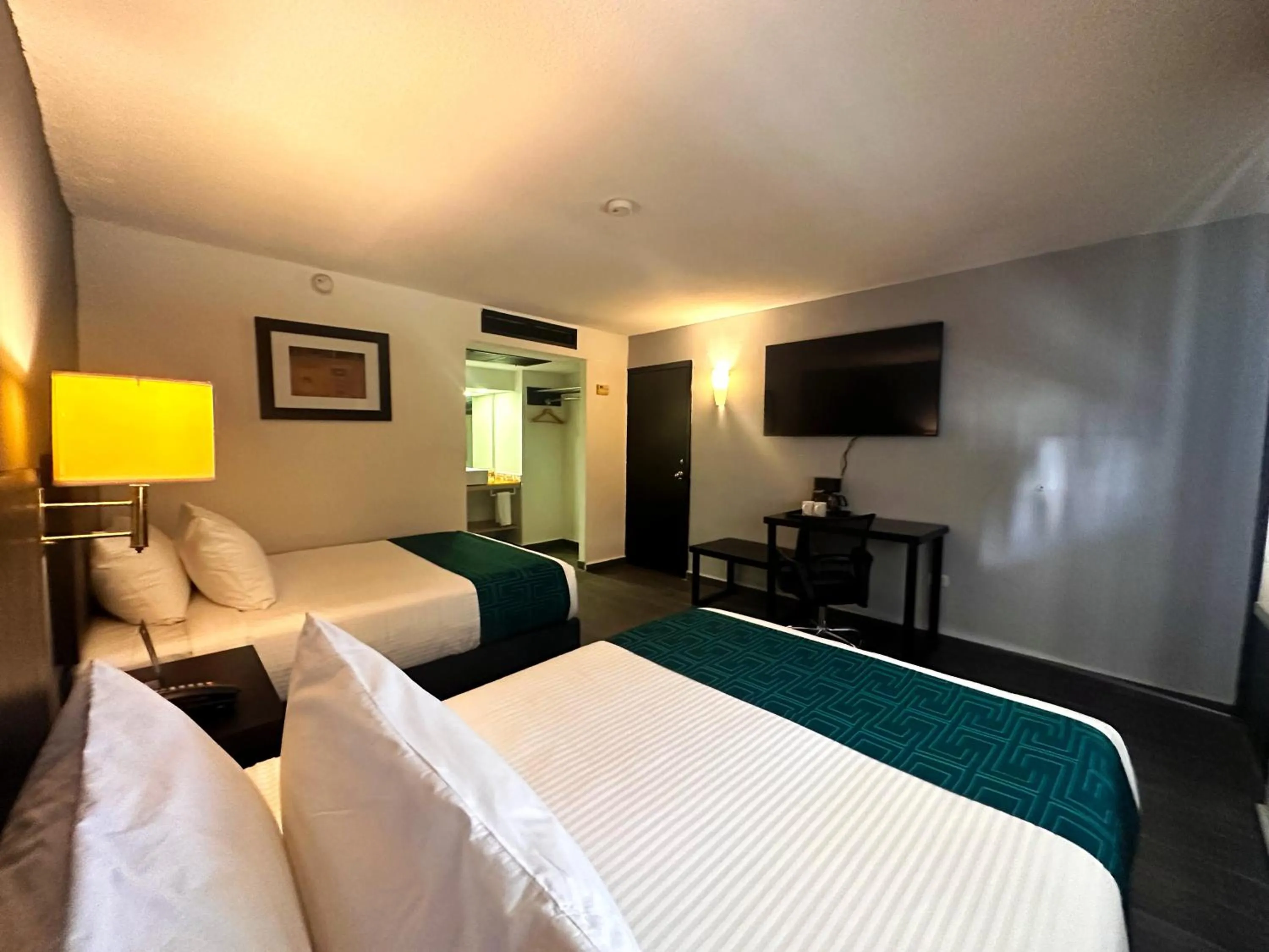 Bed in InHouse Hotel Obregón