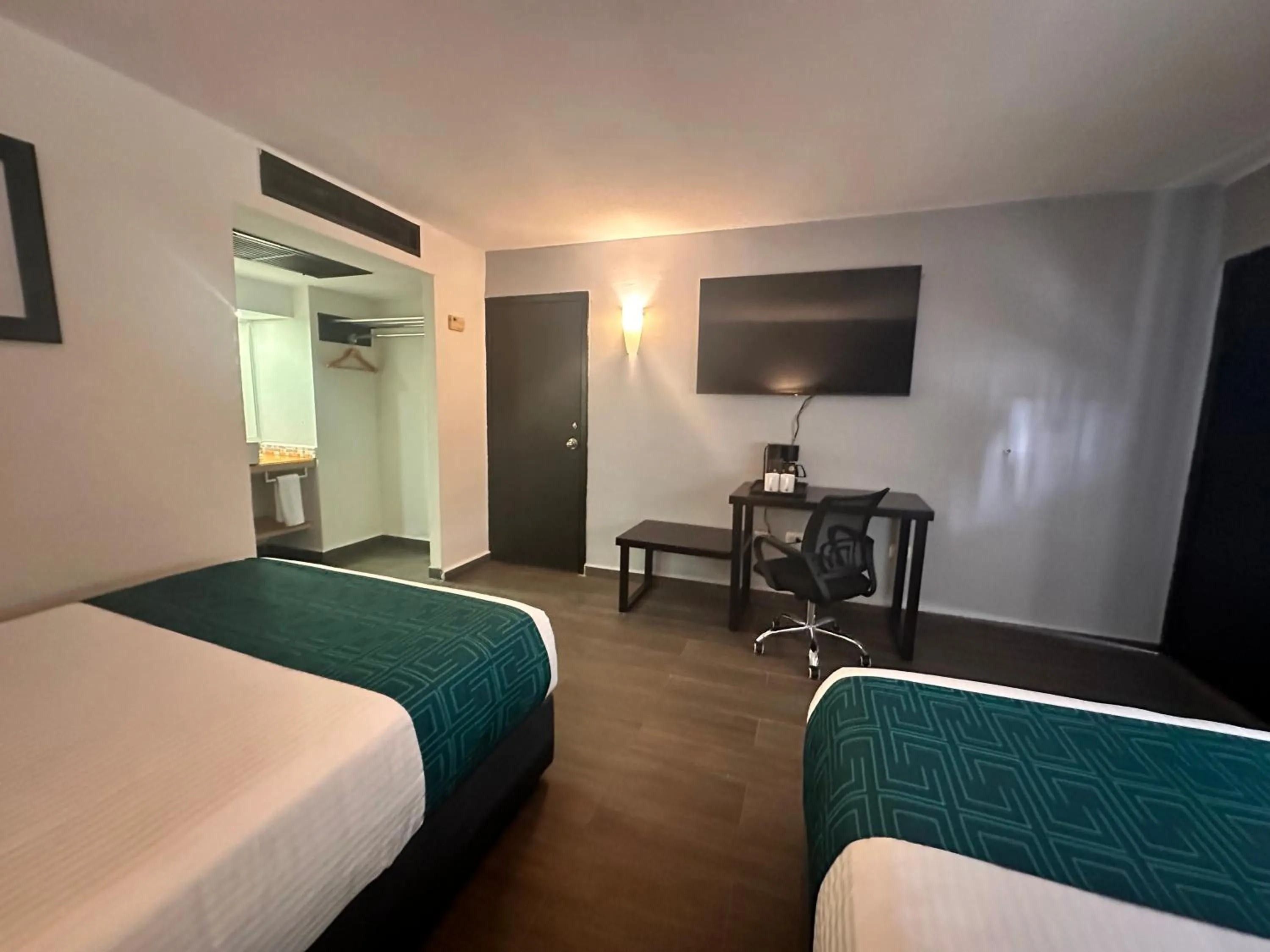 Bed in InHouse Hotel Obregón