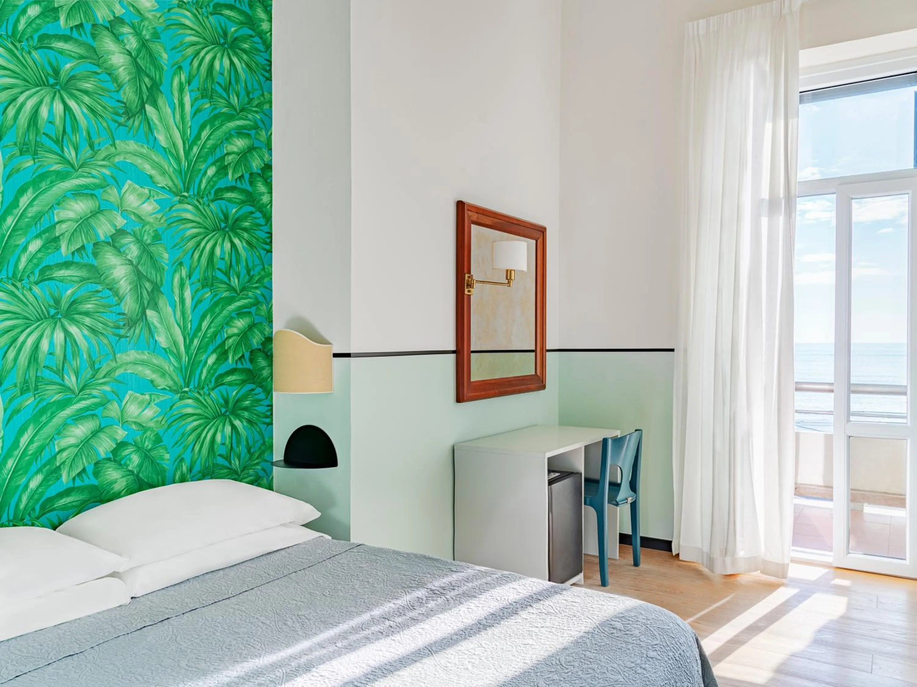 Bed in Hotel Riviera