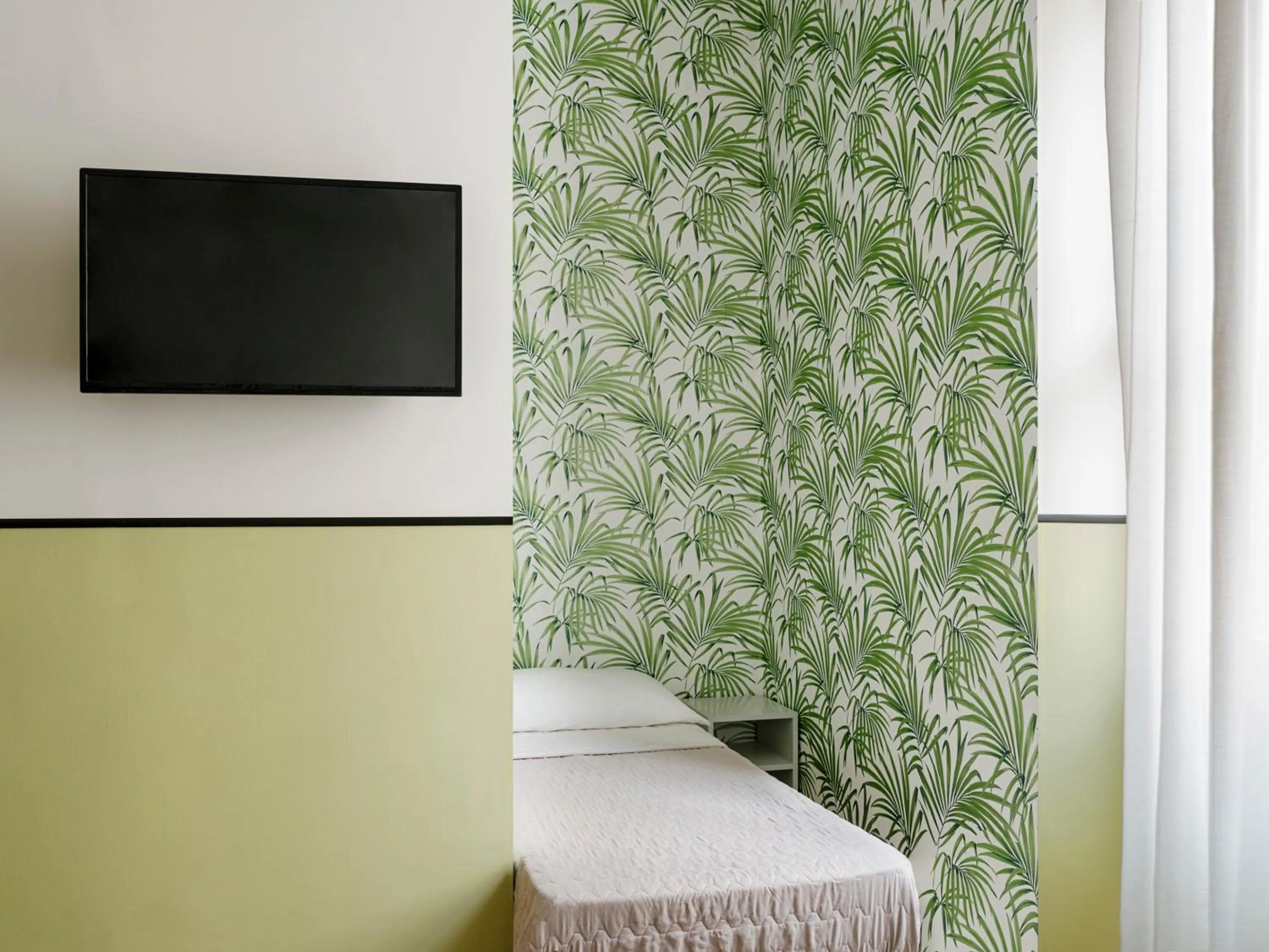 Bed in Hotel Riviera