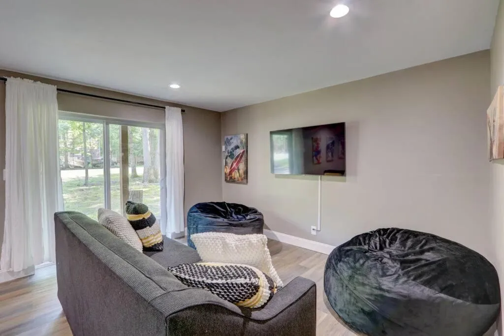 Living room in Cozy Chalet Game Rm and Fireplace