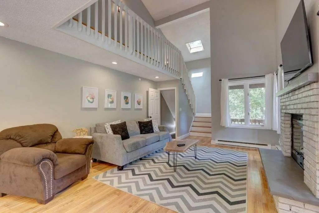 Living room in Cozy Chalet Game Rm and Fireplace